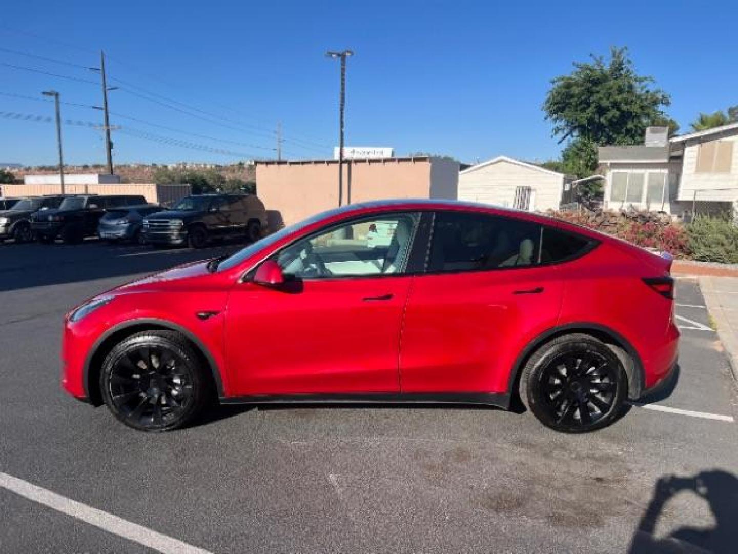 2021 Red Multi-Coat /White/Black Tesla Model Y Long Range Dual Motor All-Wheel Drive (5YJYGDEE7MF) with an ELECTRIC engine, Electric transmission, located at 1865 East Red Hills Pkwy, St. George, 84770, (435) 628-0023, 37.120850, -113.543640 - Excellent Tesla Model Y Long Range All Wheel Drive. HW3. Inside and outside in great shape. The red with white interior looks amazing. Tires are near new. All our Teslas come with charging kit. Battery is healthy. Gets 275 on full charge. Recurrent Battery Health Report 95% 1 Owner, Clean title,- Photo#5