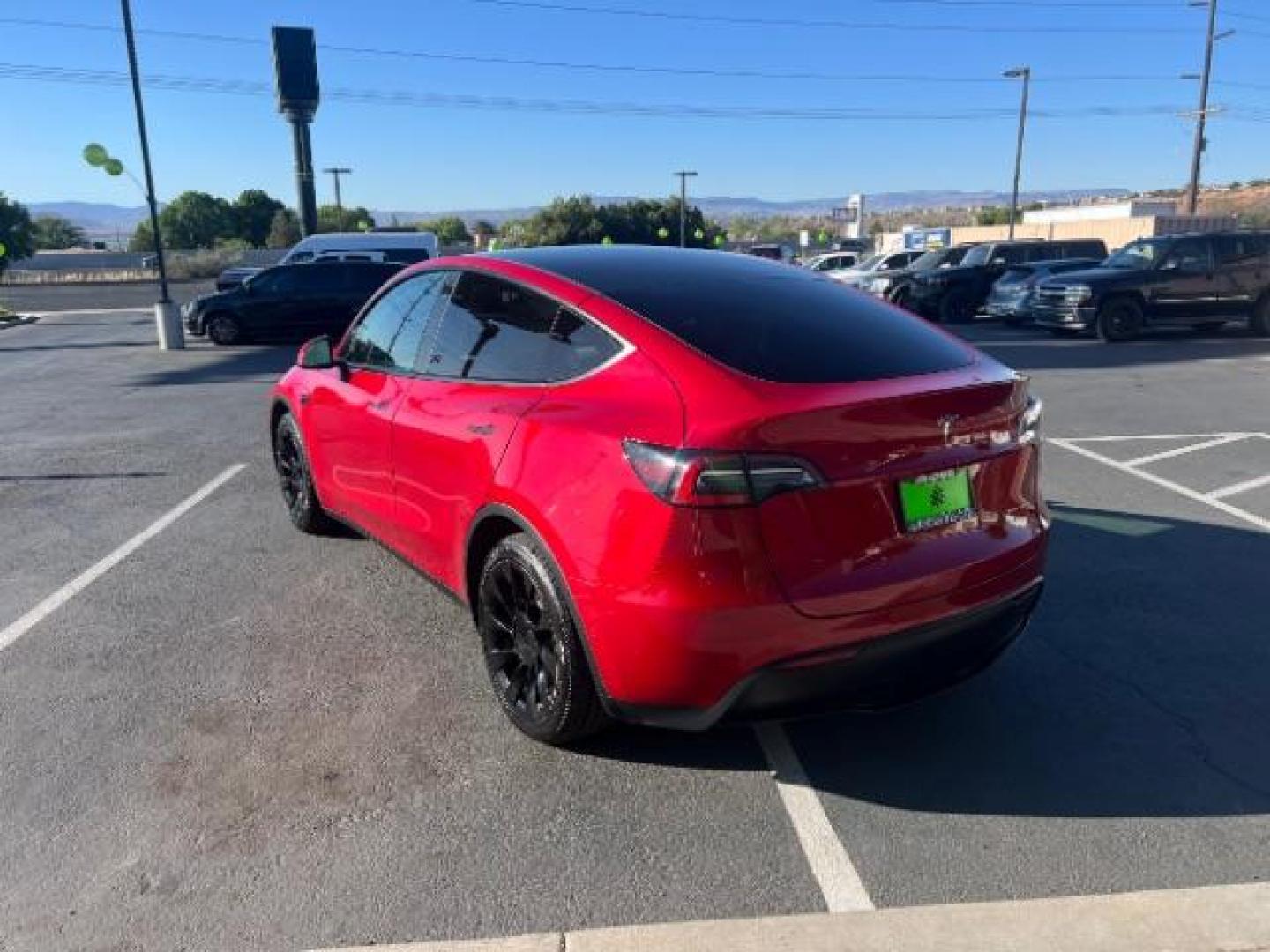 2021 Red Multi-Coat /White/Black Tesla Model Y Long Range Dual Motor All-Wheel Drive (5YJYGDEE7MF) with an ELECTRIC engine, Electric transmission, located at 1865 East Red Hills Pkwy, St. George, 84770, (435) 628-0023, 37.120850, -113.543640 - Excellent Tesla Model Y Long Range All Wheel Drive. HW3. Inside and outside in great shape. The red with white interior looks amazing. Tires are near new. All our Teslas come with charging kit. Battery is healthy. Gets 275 on full charge. Recurrent Battery Health Report 95% 1 Owner, Clean title,- Photo#6