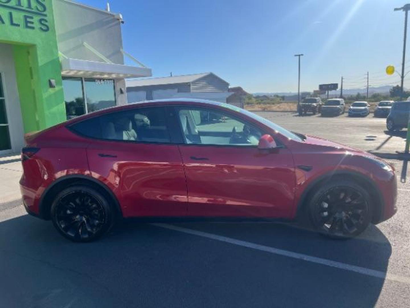 2021 Red Multi-Coat /White/Black Tesla Model Y Long Range Dual Motor All-Wheel Drive (5YJYGDEE7MF) with an ELECTRIC engine, Electric transmission, located at 1865 East Red Hills Pkwy, St. George, 84770, (435) 628-0023, 37.120850, -113.543640 - Excellent Tesla Model Y Long Range All Wheel Drive. HW3. Inside and outside in great shape. The red with white interior looks amazing. Tires are near new. All our Teslas come with charging kit. Battery is healthy. Gets 275 on full charge. Recurrent Battery Health Report 95% 1 Owner, Clean title,- Photo#9