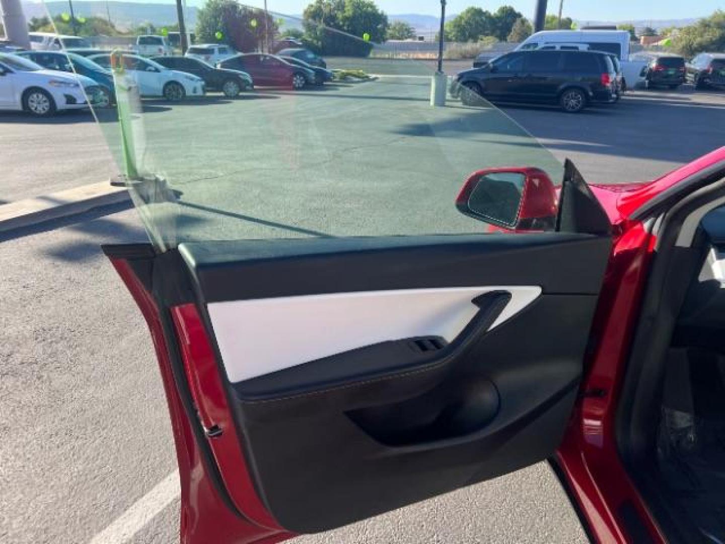 2021 Red Multi-Coat /White/Black Tesla Model Y Long Range Dual Motor All-Wheel Drive (5YJYGDEE7MF) with an ELECTRIC engine, Electric transmission, located at 1865 East Red Hills Pkwy, St. George, 84770, (435) 628-0023, 37.120850, -113.543640 - Excellent Tesla Model Y Long Range All Wheel Drive. HW3. Inside and outside in great shape. The red with white interior looks amazing. Tires are near new. All our Teslas come with charging kit. Battery is healthy. Gets 275 on full charge. Recurrent Battery Health Report 95% 1 Owner, Clean title,- Photo#14