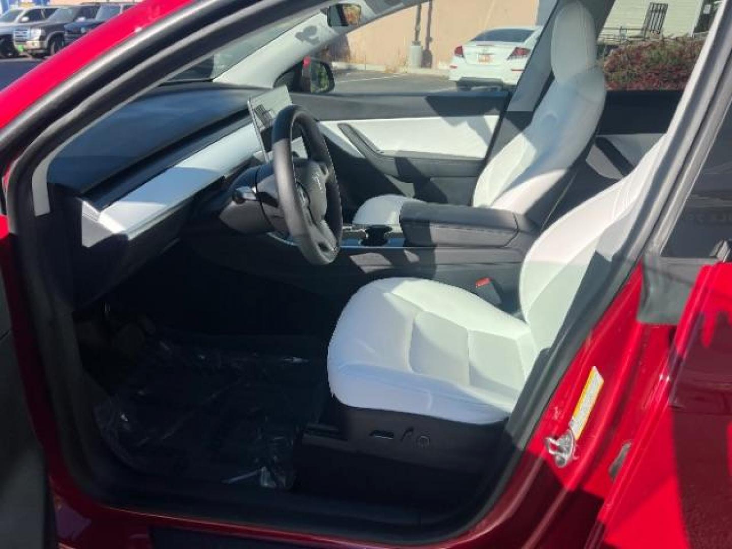 2021 Red Multi-Coat /White/Black Tesla Model Y Long Range Dual Motor All-Wheel Drive (5YJYGDEE7MF) with an ELECTRIC engine, Electric transmission, located at 1865 East Red Hills Pkwy, St. George, 84770, (435) 628-0023, 37.120850, -113.543640 - Excellent Tesla Model Y Long Range All Wheel Drive. HW3. Inside and outside in great shape. The red with white interior looks amazing. Tires are near new. All our Teslas come with charging kit. Battery is healthy. Gets 275 on full charge. Recurrent Battery Health Report 95% 1 Owner, Clean title,- Photo#16