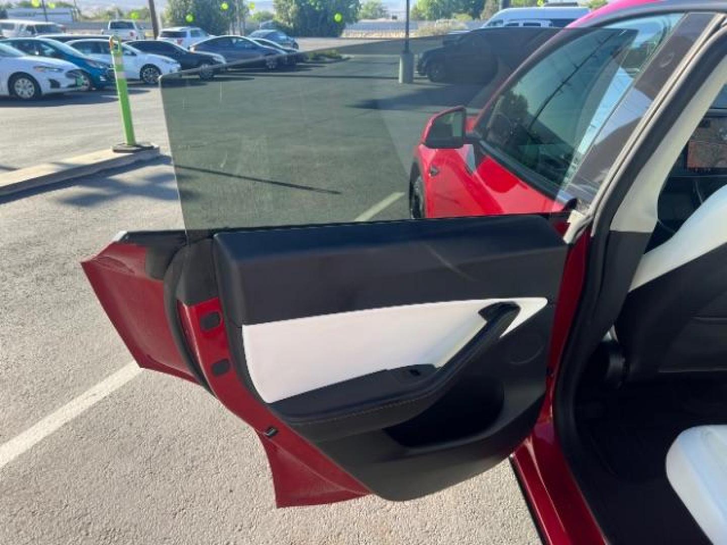 2021 Red Multi-Coat /White/Black Tesla Model Y Long Range Dual Motor All-Wheel Drive (5YJYGDEE7MF) with an ELECTRIC engine, Electric transmission, located at 1865 East Red Hills Pkwy, St. George, 84770, (435) 628-0023, 37.120850, -113.543640 - Excellent Tesla Model Y Long Range All Wheel Drive. HW3. Inside and outside in great shape. The red with white interior looks amazing. Tires are near new. All our Teslas come with charging kit. Battery is healthy. Gets 275 on full charge. Recurrent Battery Health Report 95% 1 Owner, Clean title,- Photo#20