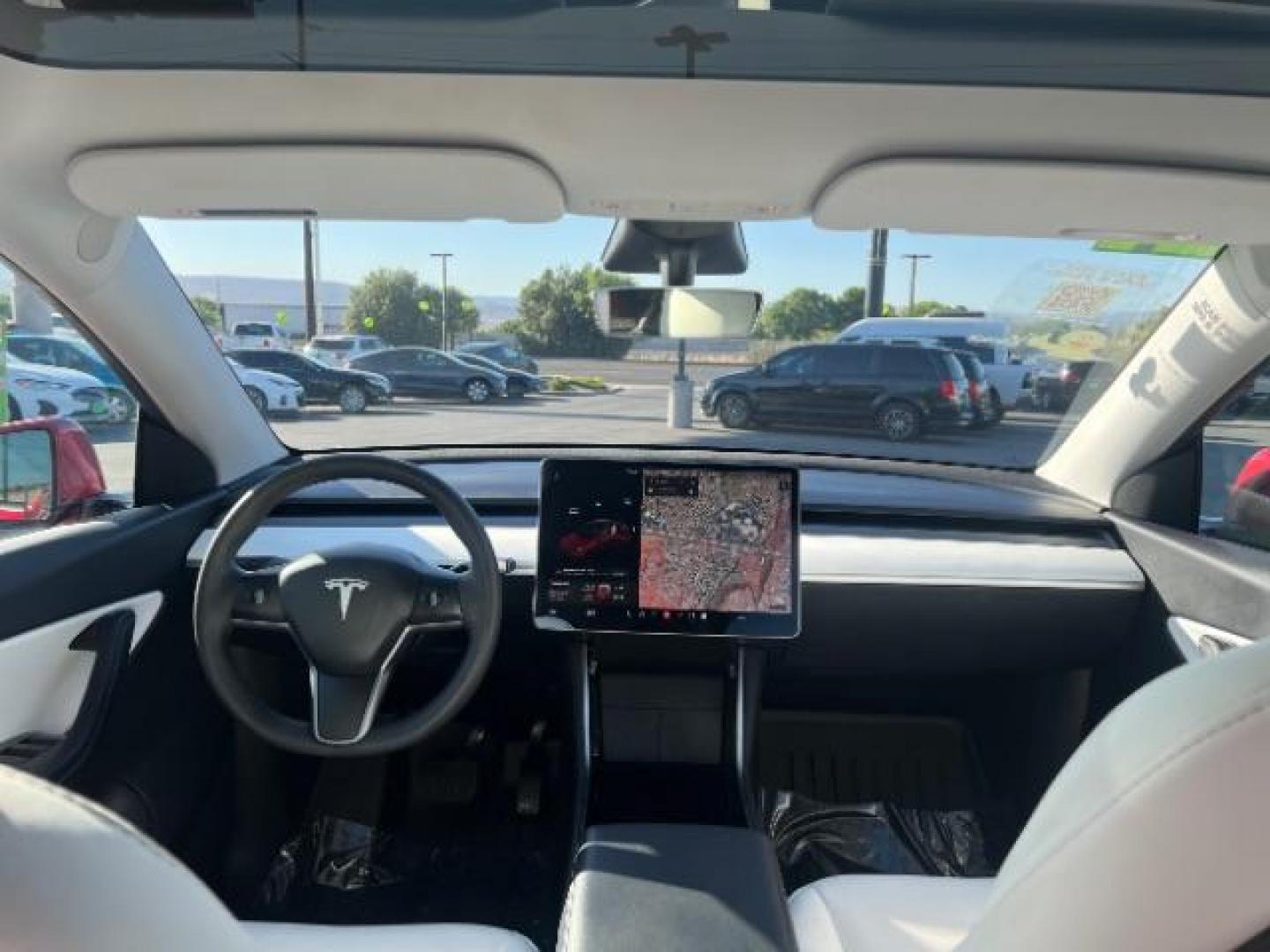 2021 Red Multi-Coat /White/Black Tesla Model Y Long Range Dual Motor All-Wheel Drive (5YJYGDEE7MF) with an ELECTRIC engine, Electric transmission, located at 1865 East Red Hills Pkwy, St. George, 84770, (435) 628-0023, 37.120850, -113.543640 - Excellent Tesla Model Y Long Range All Wheel Drive. HW3. Inside and outside in great shape. The red with white interior looks amazing. Tires are near new. All our Teslas come with charging kit. Battery is healthy. Gets 275 on full charge. Recurrent Battery Health Report 95% 1 Owner, Clean title,- Photo#23