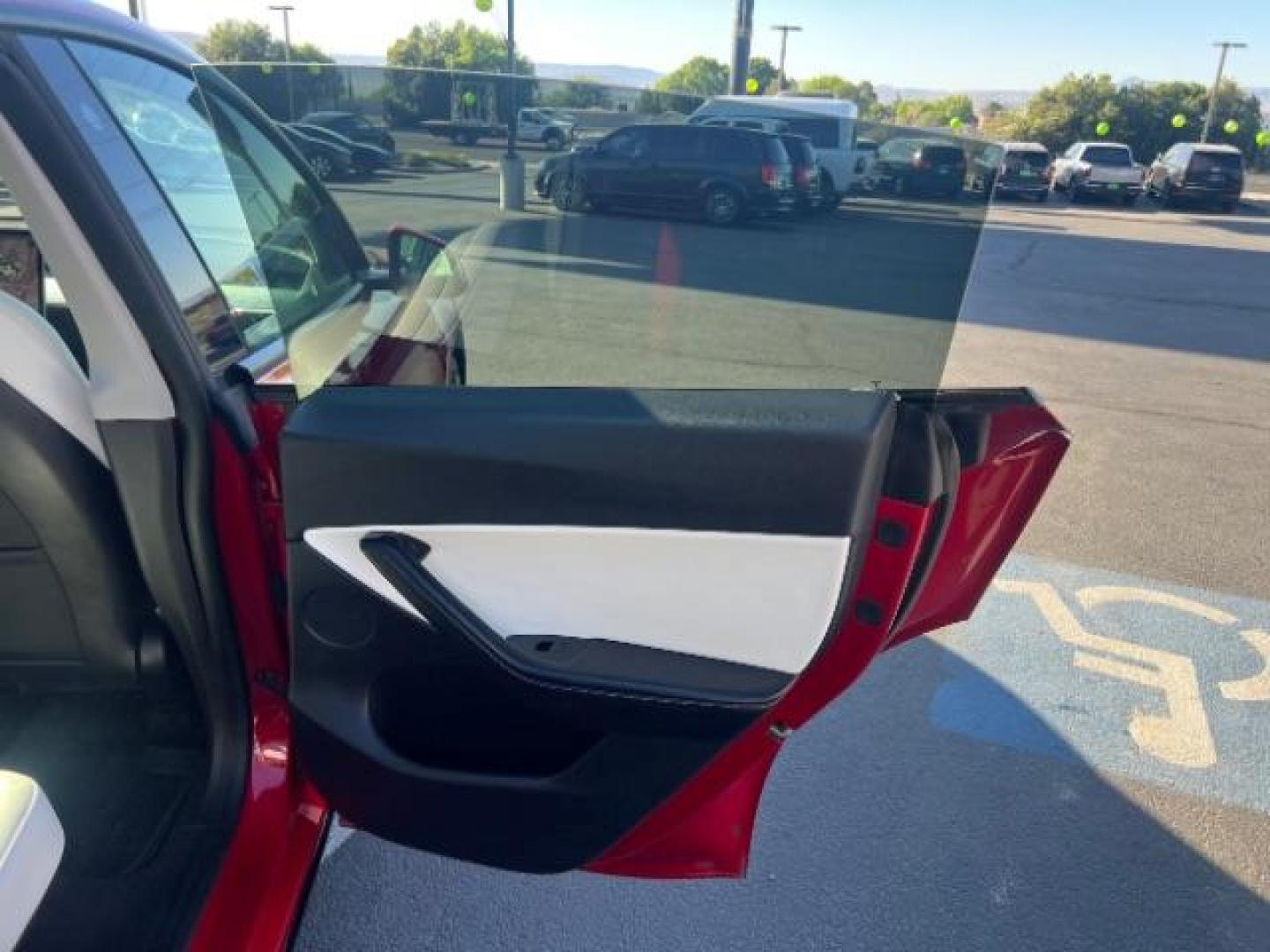 2021 Red Multi-Coat /White/Black Tesla Model Y Long Range Dual Motor All-Wheel Drive (5YJYGDEE7MF) with an ELECTRIC engine, Electric transmission, located at 1865 East Red Hills Pkwy, St. George, 84770, (435) 628-0023, 37.120850, -113.543640 - Excellent Tesla Model Y Long Range All Wheel Drive. HW3. Inside and outside in great shape. The red with white interior looks amazing. Tires are near new. All our Teslas come with charging kit. Battery is healthy. Gets 275 on full charge. Recurrent Battery Health Report 95% 1 Owner, Clean title,- Photo#25