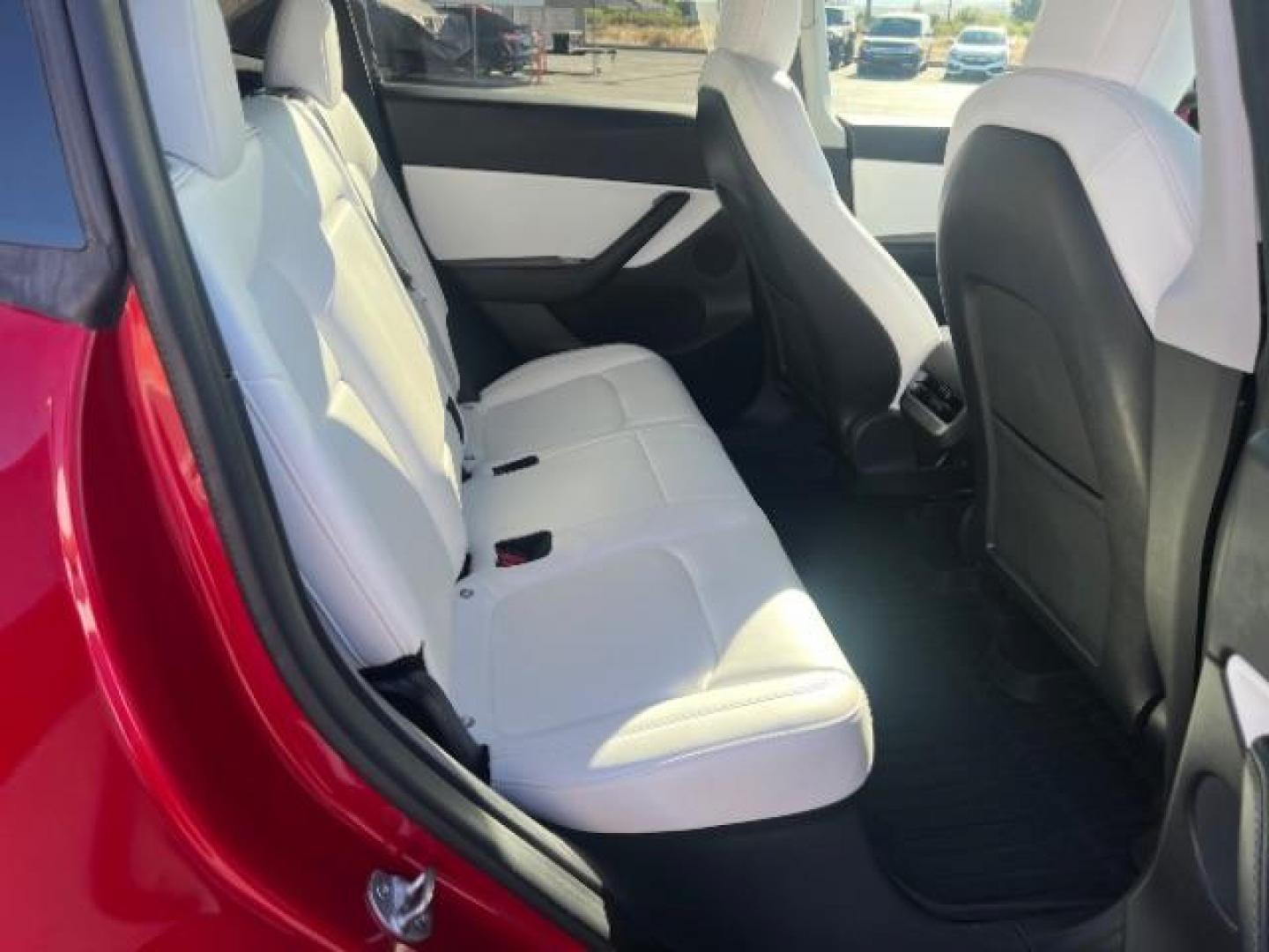 2021 Red Multi-Coat /White/Black Tesla Model Y Long Range Dual Motor All-Wheel Drive (5YJYGDEE7MF) with an ELECTRIC engine, Electric transmission, located at 1865 East Red Hills Pkwy, St. George, 84770, (435) 628-0023, 37.120850, -113.543640 - Excellent Tesla Model Y Long Range All Wheel Drive. HW3. Inside and outside in great shape. The red with white interior looks amazing. Tires are near new. All our Teslas come with charging kit. Battery is healthy. Gets 275 on full charge. Recurrent Battery Health Report 95% 1 Owner, Clean title,- Photo#26