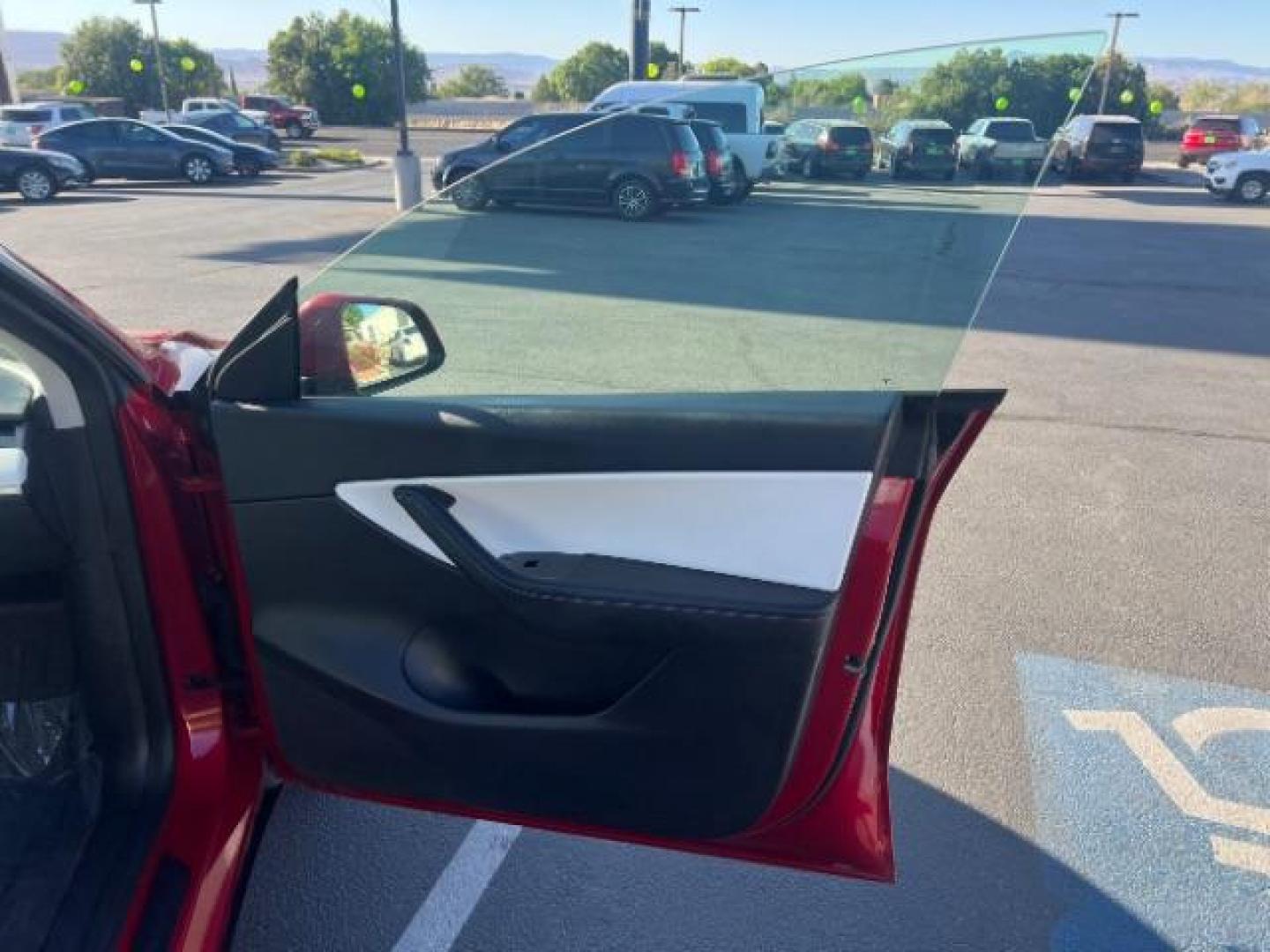 2021 Red Multi-Coat /White/Black Tesla Model Y Long Range Dual Motor All-Wheel Drive (5YJYGDEE7MF) with an ELECTRIC engine, Electric transmission, located at 1865 East Red Hills Pkwy, St. George, 84770, (435) 628-0023, 37.120850, -113.543640 - Excellent Tesla Model Y Long Range All Wheel Drive. HW3. Inside and outside in great shape. The red with white interior looks amazing. Tires are near new. All our Teslas come with charging kit. Battery is healthy. Gets 275 on full charge. Recurrent Battery Health Report 95% 1 Owner, Clean title,- Photo#27