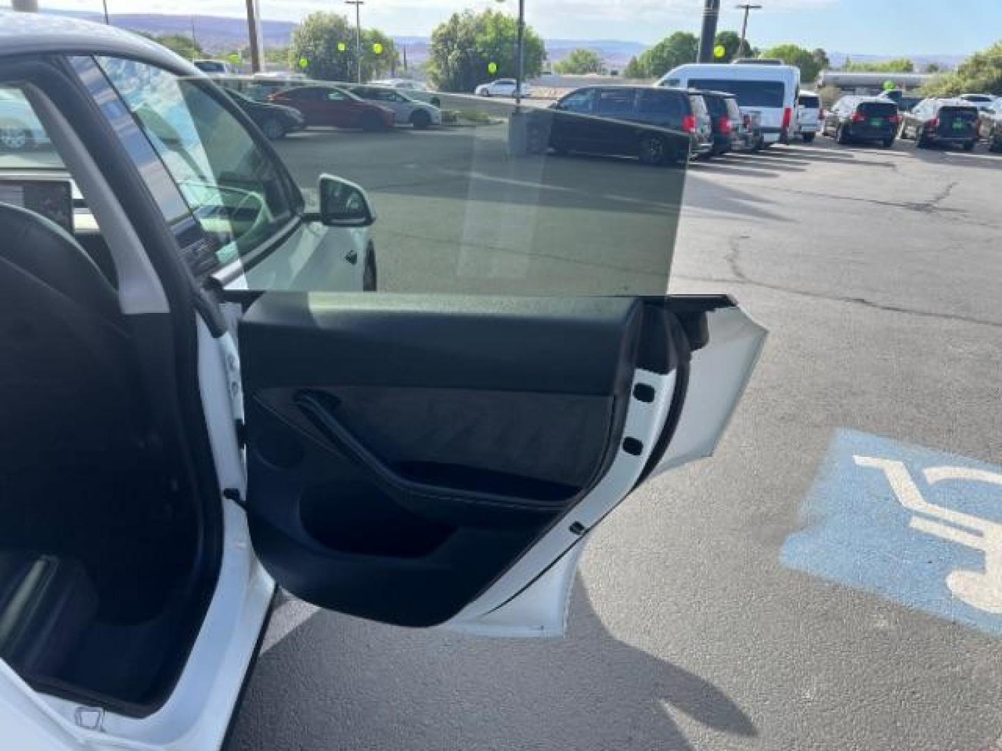 2020 White /Black Tesla Model Y Long Range Dual Motor All-Wheel Drive (5YJYGDEF2LF) with an ELECTRIC engine, Electric transmission, located at 1865 East Red Hills Pkwy, St. George, 84770, (435) 628-0023, 37.120850, -113.543640 - Excellent Tesla Model Y Long Range All Wheel Drive. HW3. Inside and outside in great shape. White exterior and black interior. Tires are in great condition All our Teslas come with charging kit. Battery is healthy. Gets 275 on full charge. Recurrent Battery Health Report 95% 2 Owner, Clean title,- Photo#25