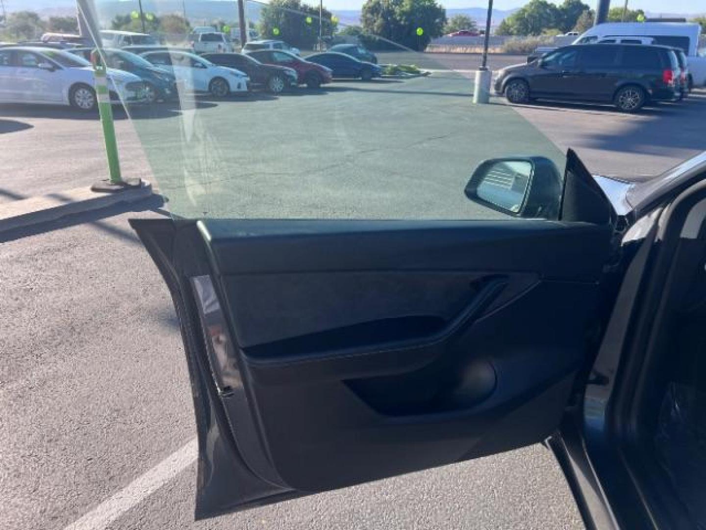 2021 Midnight Silver Metallic /Black Tesla Model Y Long Range Dual Motor All-Wheel Drive (5YJYGDEE1MF) with an ELECTRIC engine, Electric transmission, located at 1865 East Red Hills Pkwy, St. George, 84770, (435) 628-0023, 37.120850, -113.543640 - Excellent Tesla Model Y Long Range All Wheel Drive. HW3. Acceleration Boost PAID FOR ($2k upgrade). Excellent condition. Tires are in great condition All our Teslas come with charging kit. Battery is healthy. Gets 285 on full charge. Recurrent Battery Health Report 95% Clean title, 1 Owner no a- Photo#10