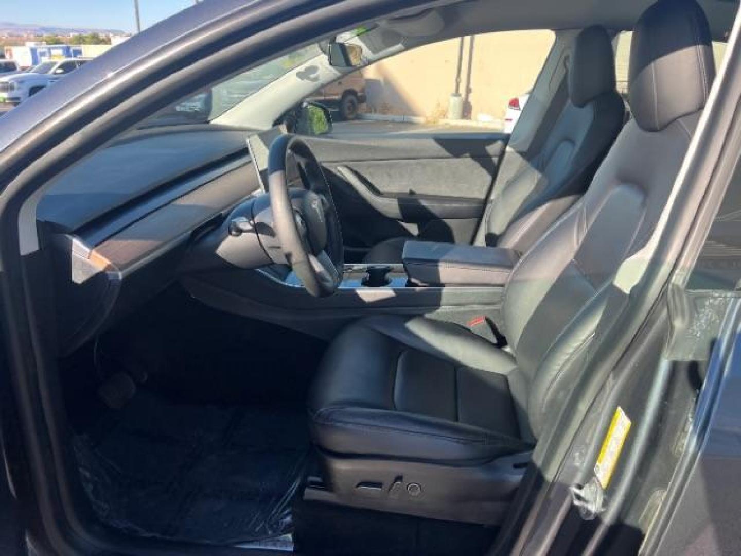 2021 Midnight Silver Metallic /Black Tesla Model Y Long Range Dual Motor All-Wheel Drive (5YJYGDEE1MF) with an ELECTRIC engine, Electric transmission, located at 1865 East Red Hills Pkwy, St. George, 84770, (435) 628-0023, 37.120850, -113.543640 - Excellent Tesla Model Y Long Range All Wheel Drive. HW3. Acceleration Boost PAID FOR ($2k upgrade). Excellent condition. Tires are in great condition All our Teslas come with charging kit. Battery is healthy. Gets 285 on full charge. Recurrent Battery Health Report 95% Clean title, 1 Owner no a- Photo#12