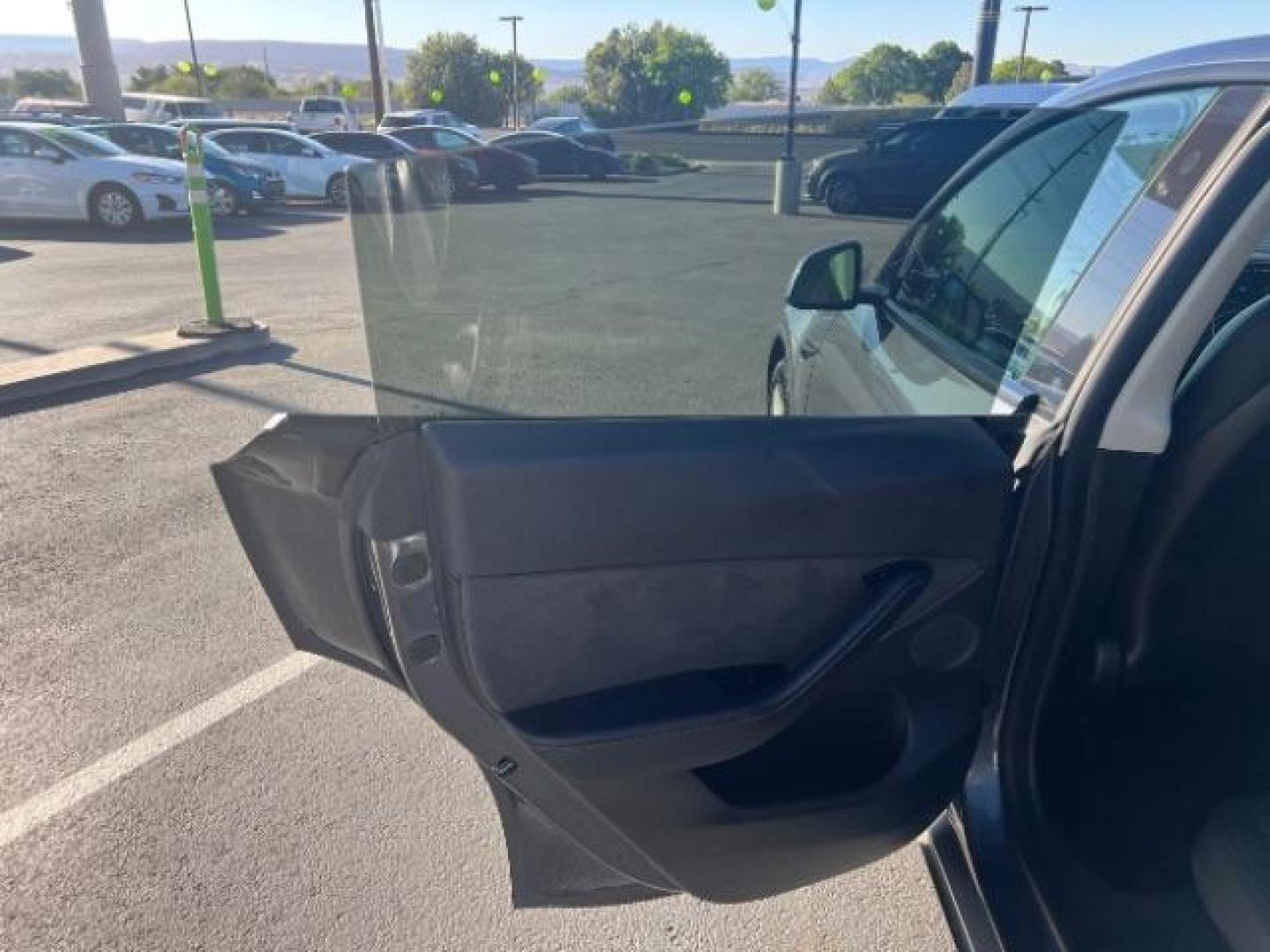 2021 Midnight Silver Metallic /Black Tesla Model Y Long Range Dual Motor All-Wheel Drive (5YJYGDEE1MF) with an ELECTRIC engine, Electric transmission, located at 1865 East Red Hills Pkwy, St. George, 84770, (435) 628-0023, 37.120850, -113.543640 - Excellent Tesla Model Y Long Range All Wheel Drive. HW3. Acceleration Boost PAID FOR ($2k upgrade). Excellent condition. Tires are in great condition All our Teslas come with charging kit. Battery is healthy. Gets 285 on full charge. Recurrent Battery Health Report 95% Clean title, 1 Owner no a- Photo#16