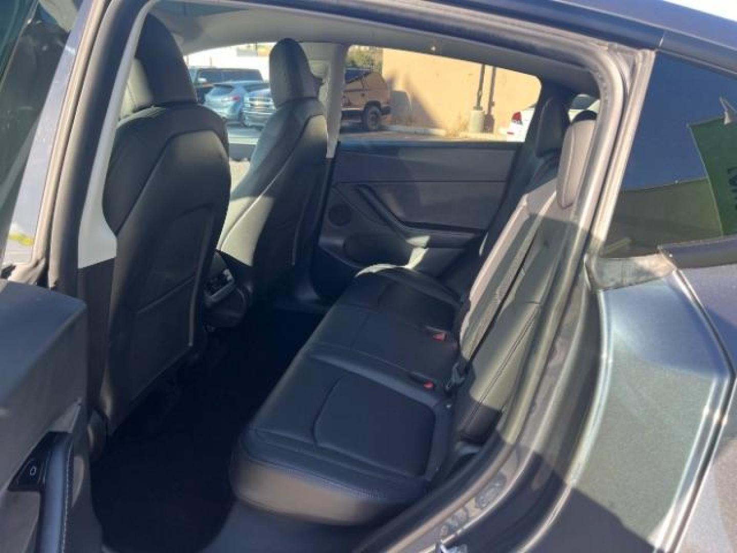 2021 Midnight Silver Metallic /Black Tesla Model Y Long Range Dual Motor All-Wheel Drive (5YJYGDEE1MF) with an ELECTRIC engine, Electric transmission, located at 1865 East Red Hills Pkwy, St. George, 84770, (435) 628-0023, 37.120850, -113.543640 - Excellent Tesla Model Y Long Range All Wheel Drive. HW3. Acceleration Boost PAID FOR ($2k upgrade). Excellent condition. Tires are in great condition All our Teslas come with charging kit. Battery is healthy. Gets 285 on full charge. Recurrent Battery Health Report 95% Clean title, 1 Owner no a- Photo#17