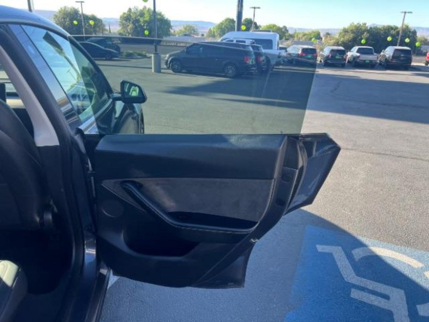 2021 Midnight Silver Metallic /Black Tesla Model Y Long Range Dual Motor All-Wheel Drive (5YJYGDEE1MF) with an ELECTRIC engine, Electric transmission, located at 1865 East Red Hills Pkwy, St. George, 84770, (435) 628-0023, 37.120850, -113.543640 - Excellent Tesla Model Y Long Range All Wheel Drive. HW3. Acceleration Boost PAID FOR ($2k upgrade). Excellent condition. Tires are in great condition All our Teslas come with charging kit. Battery is healthy. Gets 285 on full charge. Recurrent Battery Health Report 95% Clean title, 1 Owner no a- Photo#21