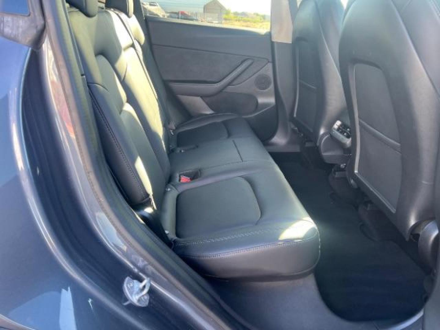 2021 Midnight Silver Metallic /Black Tesla Model Y Long Range Dual Motor All-Wheel Drive (5YJYGDEE1MF) with an ELECTRIC engine, Electric transmission, located at 1865 East Red Hills Pkwy, St. George, 84770, (435) 628-0023, 37.120850, -113.543640 - Excellent Tesla Model Y Long Range All Wheel Drive. HW3. Acceleration Boost PAID FOR ($2k upgrade). Excellent condition. Tires are in great condition All our Teslas come with charging kit. Battery is healthy. Gets 285 on full charge. Recurrent Battery Health Report 95% Clean title, 1 Owner no a- Photo#22
