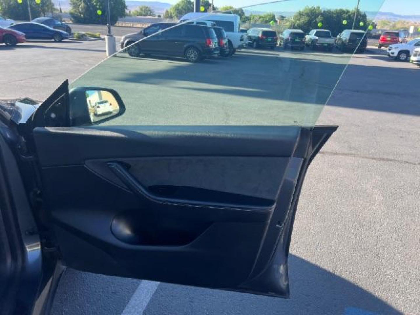 2021 Midnight Silver Metallic /Black Tesla Model Y Long Range Dual Motor All-Wheel Drive (5YJYGDEE1MF) with an ELECTRIC engine, Electric transmission, located at 1865 East Red Hills Pkwy, St. George, 84770, (435) 628-0023, 37.120850, -113.543640 - Excellent Tesla Model Y Long Range All Wheel Drive. HW3. Acceleration Boost PAID FOR ($2k upgrade). Excellent condition. Tires are in great condition All our Teslas come with charging kit. Battery is healthy. Gets 285 on full charge. Recurrent Battery Health Report 95% Clean title, 1 Owner no a- Photo#24