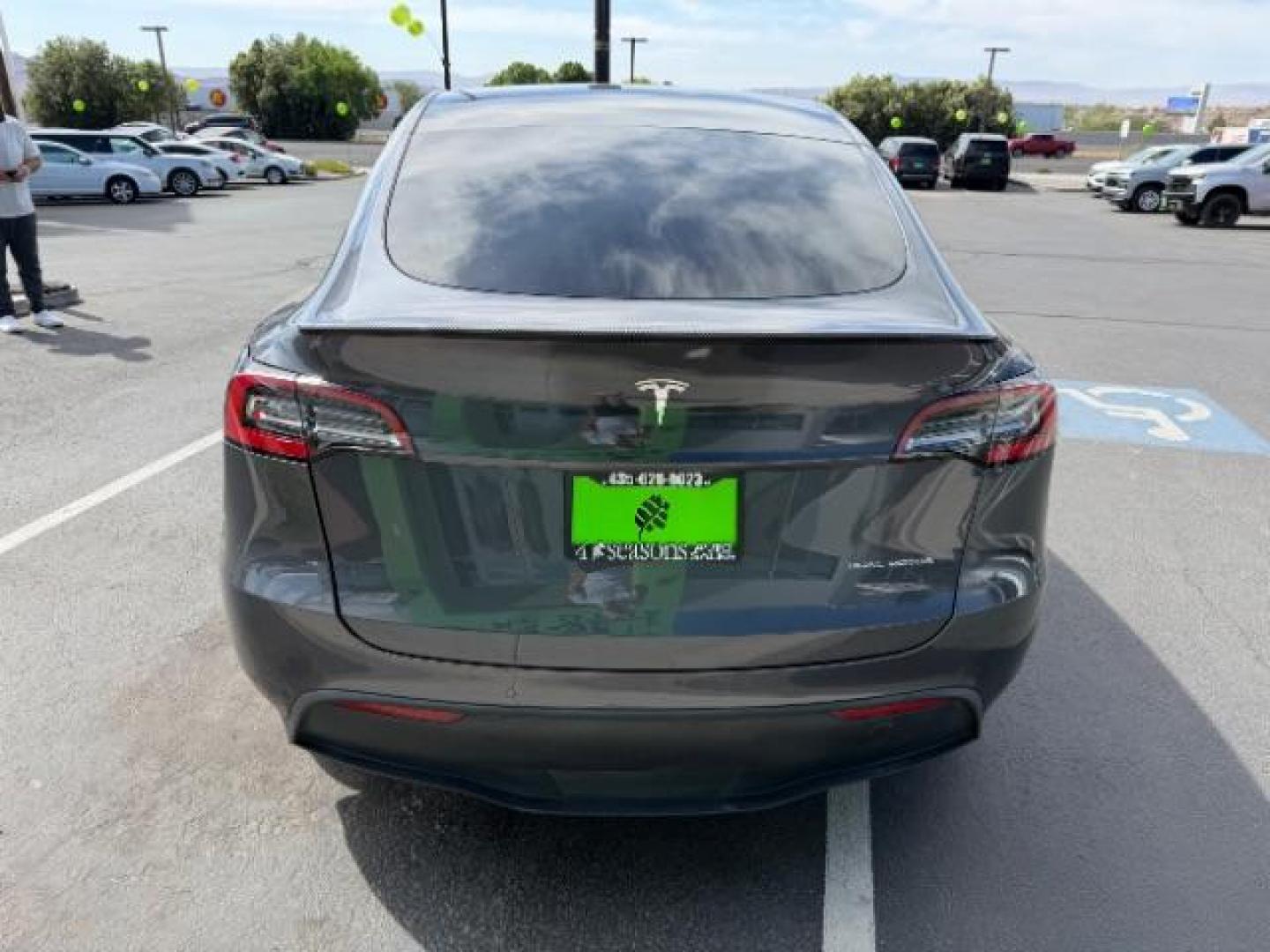 2021 Midnight Silver Metallic /Black Tesla Model Y Long Range Dual Motor All-Wheel Drive (5YJYGDEE1MF) with an ELECTRIC engine, Electric transmission, located at 1865 East Red Hills Pkwy, St. George, 84770, (435) 628-0023, 37.120850, -113.543640 - Excellent Tesla Model Y Long Range All Wheel Drive. HW3. Acceleration Boost PAID FOR ($2k upgrade). Excellent condition. Tires are in great condition All our Teslas come with charging kit. Battery is healthy. Gets 285 on full charge. Recurrent Battery Health Report 95% Clean title, 1 Owner no a- Photo#2