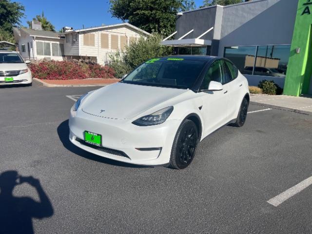 2022 Pearl White Multi-Coat /Black Tesla Model Y Long Range Dual Motor All-Wheel Drive (7SAYGDEE5NF) with an ELECTRIC engine, Electric transmission, located at 1865 East Red Hills Pkwy, St. George, 84770, (435) 628-0023, 37.120850, -113.543640 - Excellent Tesla Model Y Long Range All Wheel Drive. HW3. In great condition for the miles. Most affordable model Y you'll find. Act now! All our Teslas come with mobile charging kit. Battery is healthy. Gets 265 on full charge. Clean title, 1 Owner Recurrent Battery Report 95% Still has remaini - Photo#4