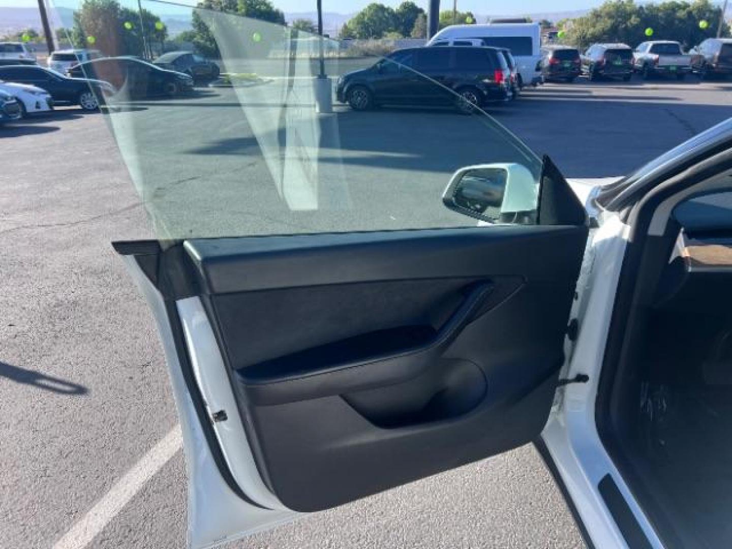 2022 Pearl White Multi-Coat /Black Tesla Model Y Long Range Dual Motor All-Wheel Drive (7SAYGDEE5NF) with an ELECTRIC engine, Electric transmission, located at 1865 East Red Hills Pkwy, St. George, 84770, (435) 628-0023, 37.120850, -113.543640 - Excellent Tesla Model Y Long Range All Wheel Drive. HW3. In great condition for the miles. Most affordable model Y you'll find. Act now! All our Teslas come with mobile charging kit. Battery is healthy. Gets 265 on full charge. Clean title, 1 Owner Recurrent Battery Report 95% Still has remaini- Photo#14