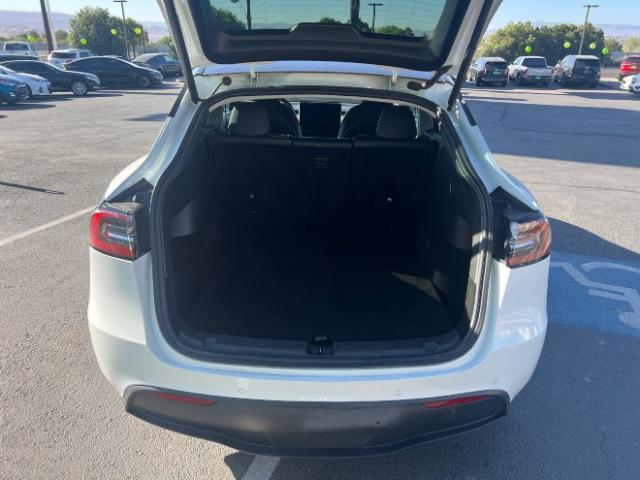 2022 Pearl White Multi-Coat /Black Tesla Model Y Long Range Dual Motor All-Wheel Drive (7SAYGDEE5NF) with an ELECTRIC engine, Electric transmission, located at 1865 East Red Hills Pkwy, St. George, 84770, (435) 628-0023, 37.120850, -113.543640 - Excellent Tesla Model Y Long Range All Wheel Drive. HW3. In great condition for the miles. Most affordable model Y you'll find. Act now! All our Teslas come with mobile charging kit. Battery is healthy. Gets 265 on full charge. Clean title, 1 Owner Recurrent Battery Report 95% Still has remaini - Photo#24