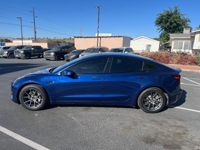 2022 Deep Blue Metallic /Black Tesla Model 3 Long Range Dual Motor All-Wheel Drive (5YJ3E1EB2NF) with an ELECTRIC engine, Electric transmission, located at 1865 East Red Hills Pkwy, St. George, 84770, (435) 628-0023, 37.120850, -113.543640 - Excellent Tesla Model 3 Long Range All Wheel Drive. HW3. in excellent condition. Tires are in great shape All our Teslas come with mobile charging kit. Battery is healthy. Gets 295 on full charge. Recurrent Battery Health Report 92% 2 owner Clean title, no accidents Still has remaining 120k mil - Photo#5