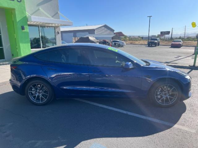 2022 Deep Blue Metallic /Black Tesla Model 3 Long Range Dual Motor All-Wheel Drive (5YJ3E1EB2NF) with an ELECTRIC engine, Electric transmission, located at 1865 East Red Hills Pkwy, St. George, 84770, (435) 628-0023, 37.120850, -113.543640 - Excellent Tesla Model 3 Long Range All Wheel Drive. HW3. in excellent condition. Tires are in great shape All our Teslas come with mobile charging kit. Battery is healthy. Gets 295 on full charge. Recurrent Battery Health Report 92% 2 owner Clean title, no accidents Still has remaining 120k mil - Photo#9