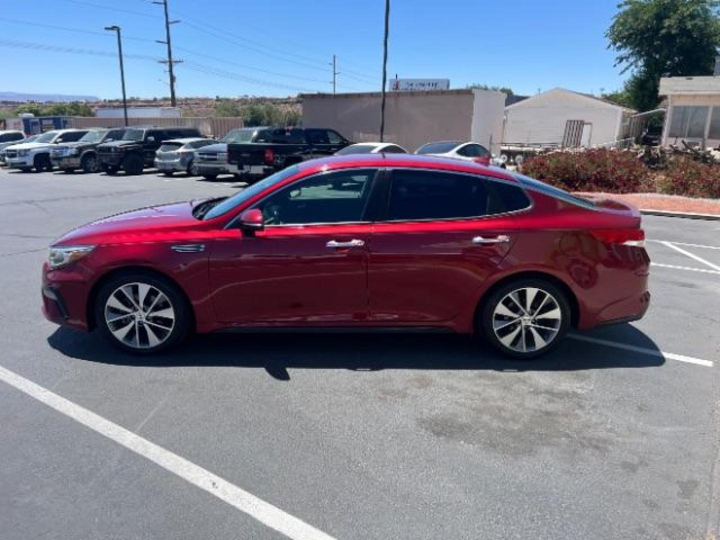 2019 Passion Red /Black Kia Optima S (5XXGT4L37KG) with an Theta II 2.4L I-4 gasoline direct injection engine, Automatic transmission, located at 1865 East Red Hills Pkwy, St. George, 84770, (435) 628-0023, 37.120850, -113.543640 - We specialize in helping ALL people get the best financing available. No matter your credit score, good, bad or none we can get you an amazing rate. Had a bankruptcy, divorce, or repossessions? We give you the green light to get your credit back on the road. Low down and affordable payments that fit - Photo#3
