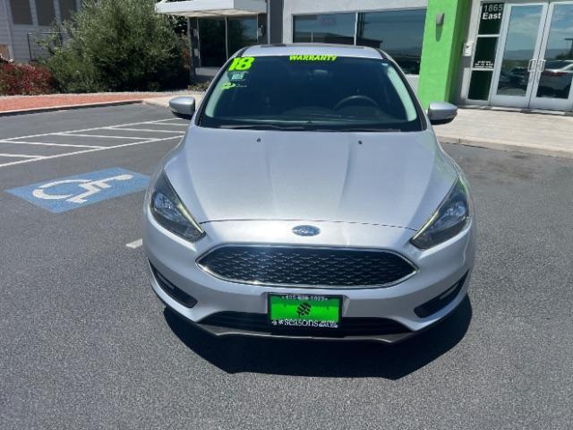 2018 Ingot Silver Metallic /Charcoal Black Ford Focus SEL (1FADP3H20JL) with an 2L I-4 gasoline direct injection engine, Automatic transmission, located at 940 North Main Street, Cedar City, UT, 84720, (435) 628-0023, 37.692936, -113.061897 - We specialize in helping ALL people get the best financing available. No matter your credit score, good, bad or none we can get you an amazing rate. Had a bankruptcy, divorce, or repossessions? We give you the green light to get your credit back on the road. Low down and affordable payments that fit - Photo#1