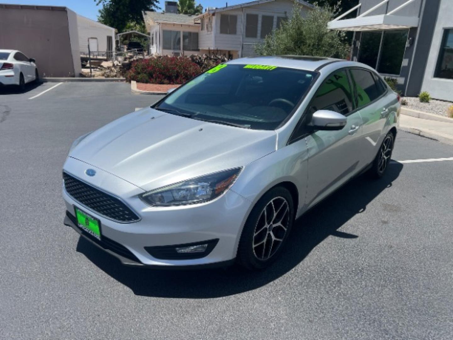 2018 Ingot Silver Metallic /Charcoal Black Ford Focus SEL (1FADP3H20JL) with an 2L I-4 gasoline direct injection engine, Automatic transmission, located at 940 North Main Street, Cedar City, UT, 84720, (435) 628-0023, 37.692936, -113.061897 - We specialize in helping ALL people get the best financing available. No matter your credit score, good, bad or none we can get you an amazing rate. Had a bankruptcy, divorce, or repossessions? We give you the green light to get your credit back on the road. Low down and affordable payments that fit- Photo#2