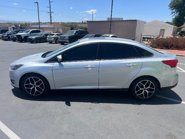 2018 Ingot Silver Metallic /Charcoal Black Ford Focus SEL (1FADP3H20JL) with an 2L I-4 gasoline direct injection engine, Automatic transmission, located at 940 North Main Street, Cedar City, UT, 84720, (435) 628-0023, 37.692936, -113.061897 - We specialize in helping ALL people get the best financing available. No matter your credit score, good, bad or none we can get you an amazing rate. Had a bankruptcy, divorce, or repossessions? We give you the green light to get your credit back on the road. Low down and affordable payments that fit - Photo#3