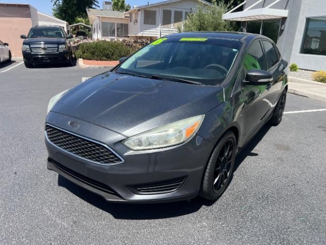 2016 Magnetic /Charcoal Black Ford Focus SE (1FADP3F28GL) , Automatic transmission, located at 1865 East Red Hills Pkwy, St. George, 84770, (435) 628-0023, 37.120850, -113.543640 - We specialize in helping ALL people get the best financing available. No matter your credit score, good, bad or none we can get you an amazing rate. Had a bankruptcy, divorce, or repossessions? We give you the green light to get your credit back on the road. Low down and affordable payments that fit- Photo#2