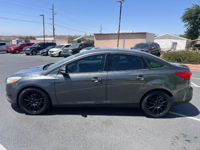 2016 Magnetic /Charcoal Black Ford Focus SE (1FADP3F28GL) , Automatic transmission, located at 1865 East Red Hills Pkwy, St. George, 84770, (435) 628-0023, 37.120850, -113.543640 - We specialize in helping ALL people get the best financing available. No matter your credit score, good, bad or none we can get you an amazing rate. Had a bankruptcy, divorce, or repossessions? We give you the green light to get your credit back on the road. Low down and affordable payments that fit- Photo#3