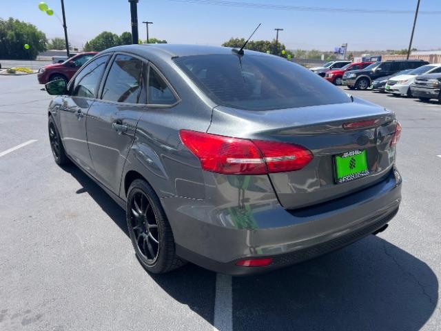 2016 Magnetic /Charcoal Black Ford Focus SE (1FADP3F28GL) , Automatic transmission, located at 1865 East Red Hills Pkwy, St. George, 84770, (435) 628-0023, 37.120850, -113.543640 - We specialize in helping ALL people get the best financing available. No matter your credit score, good, bad or none we can get you an amazing rate. Had a bankruptcy, divorce, or repossessions? We give you the green light to get your credit back on the road. Low down and affordable payments that fit- Photo#4