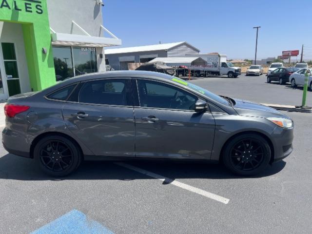 2016 Magnetic /Charcoal Black Ford Focus SE (1FADP3F28GL) , Automatic transmission, located at 1865 East Red Hills Pkwy, St. George, 84770, (435) 628-0023, 37.120850, -113.543640 - We specialize in helping ALL people get the best financing available. No matter your credit score, good, bad or none we can get you an amazing rate. Had a bankruptcy, divorce, or repossessions? We give you the green light to get your credit back on the road. Low down and affordable payments that fit- Photo#7