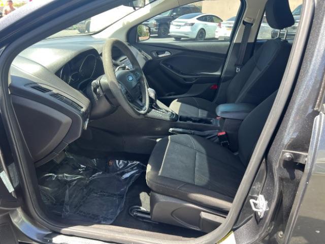 2016 Magnetic /Charcoal Black Ford Focus SE (1FADP3F28GL) , Automatic transmission, located at 1865 East Red Hills Pkwy, St. George, 84770, (435) 628-0023, 37.120850, -113.543640 - We specialize in helping ALL people get the best financing available. No matter your credit score, good, bad or none we can get you an amazing rate. Had a bankruptcy, divorce, or repossessions? We give you the green light to get your credit back on the road. Low down and affordable payments that fit- Photo#14