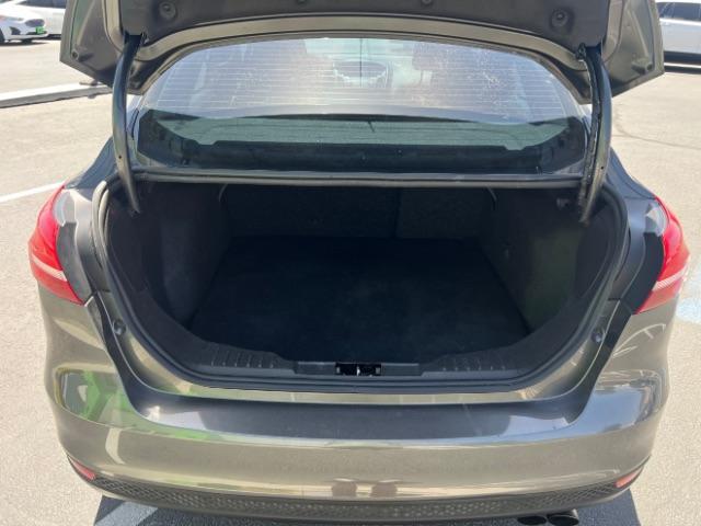 2016 Magnetic /Charcoal Black Ford Focus SE (1FADP3F28GL) , Automatic transmission, located at 1865 East Red Hills Pkwy, St. George, 84770, (435) 628-0023, 37.120850, -113.543640 - We specialize in helping ALL people get the best financing available. No matter your credit score, good, bad or none we can get you an amazing rate. Had a bankruptcy, divorce, or repossessions? We give you the green light to get your credit back on the road. Low down and affordable payments that fit- Photo#23