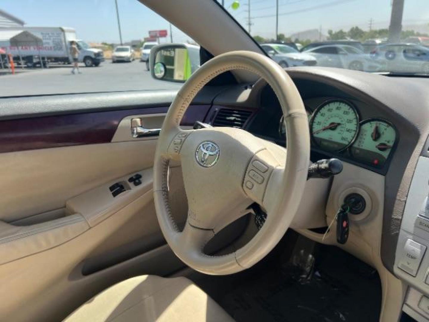 2004 Arctic Frost Pearl /Ivory Toyota Camry Solara SE V6 | SE Sport V6 | SLE V6 (4T1CA30P14U) with an 3.3L V-6 DOHC engine, Automatic transmission, located at 1865 East Red Hills Pkwy, St. George, 84770, (435) 628-0023, 37.120850, -113.543640 - We specialize in helping ALL people get the best financing available. No matter your credit score, good, bad or none we can get you an amazing rate. Had a bankruptcy, divorce, or repossessions? We give you the green light to get your credit back on the road. Low down and affordable payments that fit- Photo#25
