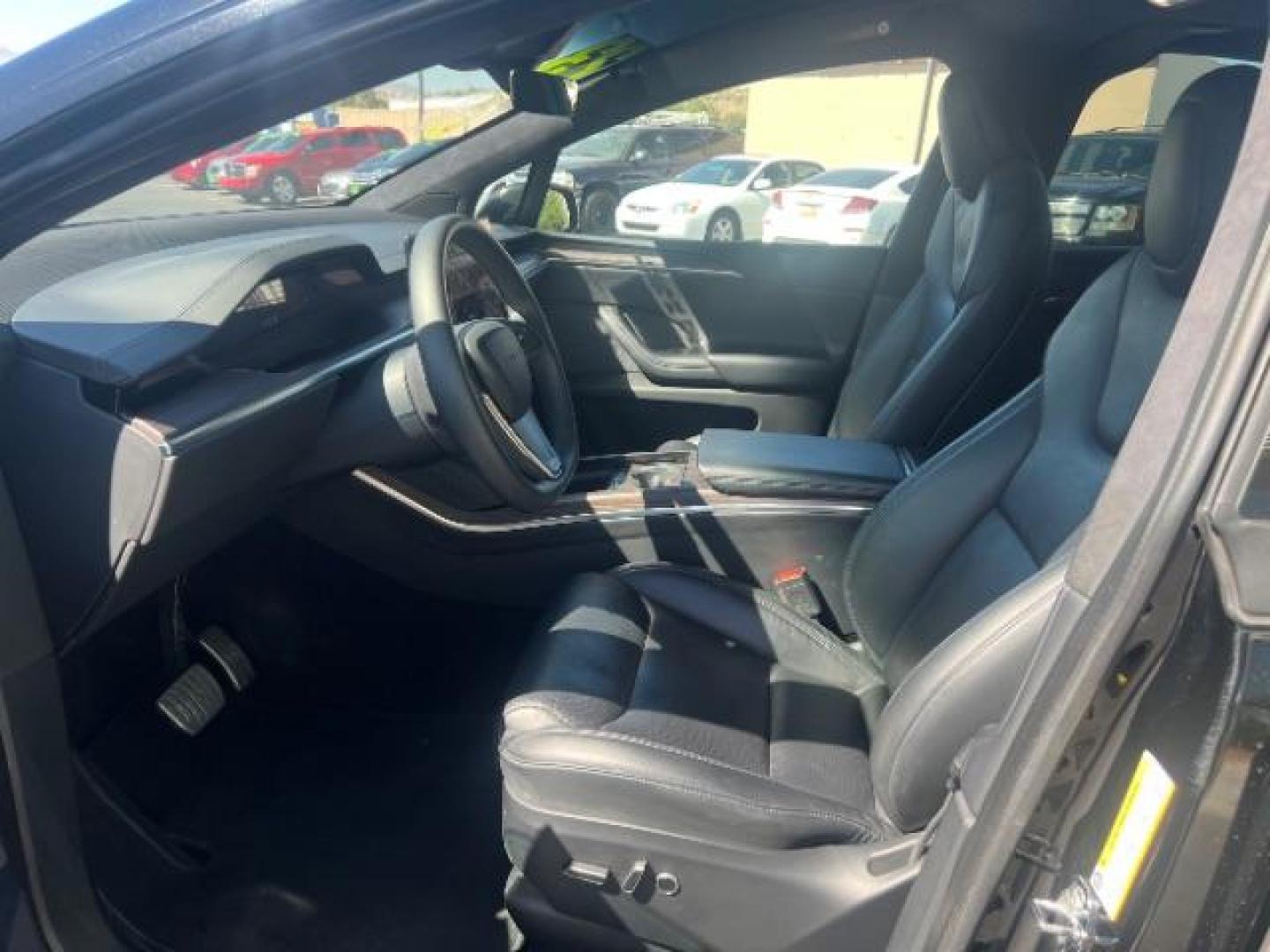 2023 Solid Black /Black Tesla Model X Dual Motor All-Wheel Drive (7SAXCAE52PF) with an ELECTRIC engine, Electric transmission, located at 1865 East Red Hills Pkwy, St. George, 84770, (435) 628-0023, 37.120850, -113.543640 - Perfect condition HW4 Tesla Model X All Wheel Drive. with 7 Seats!, Hepa filter, 20 wheels, Tow hitch. Black on black looks amazing. The Model X is discontinued and the absolutly best tesla made. Tires are in great condition. Remaining Tesla basic warranty until Nov 19, 2027 or 50k miles. Battery- Photo#20