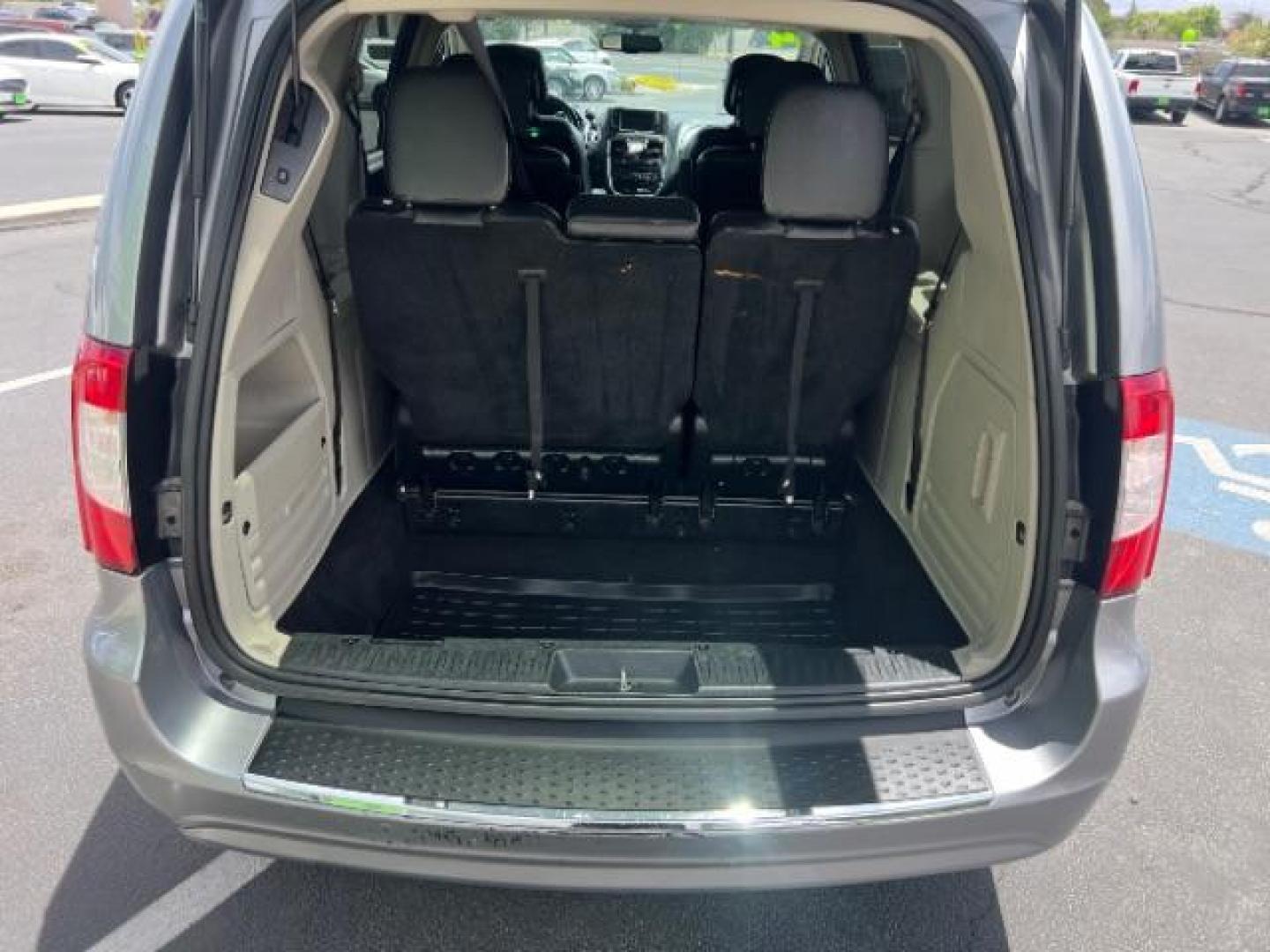 2014 Billet Silver Metallic Clearcoat /Black/Light Graystone Chrysler Town and Country Touring (2C4RC1BG1ER) with an Pentastar 3.6L V-6 DOHC engine, Automatic transmission, located at 940 North Main Street, Cedar City, UT, 84720, (435) 628-0023, 37.692936, -113.061897 - We specialize in helping ALL people get the best financing available. No matter your credit score, good, bad or none we can get you an amazing rate. Had a bankruptcy, divorce, or repossessions? We give you the green light to get your credit back on the road. Low down and affordable payments that fit- Photo#25