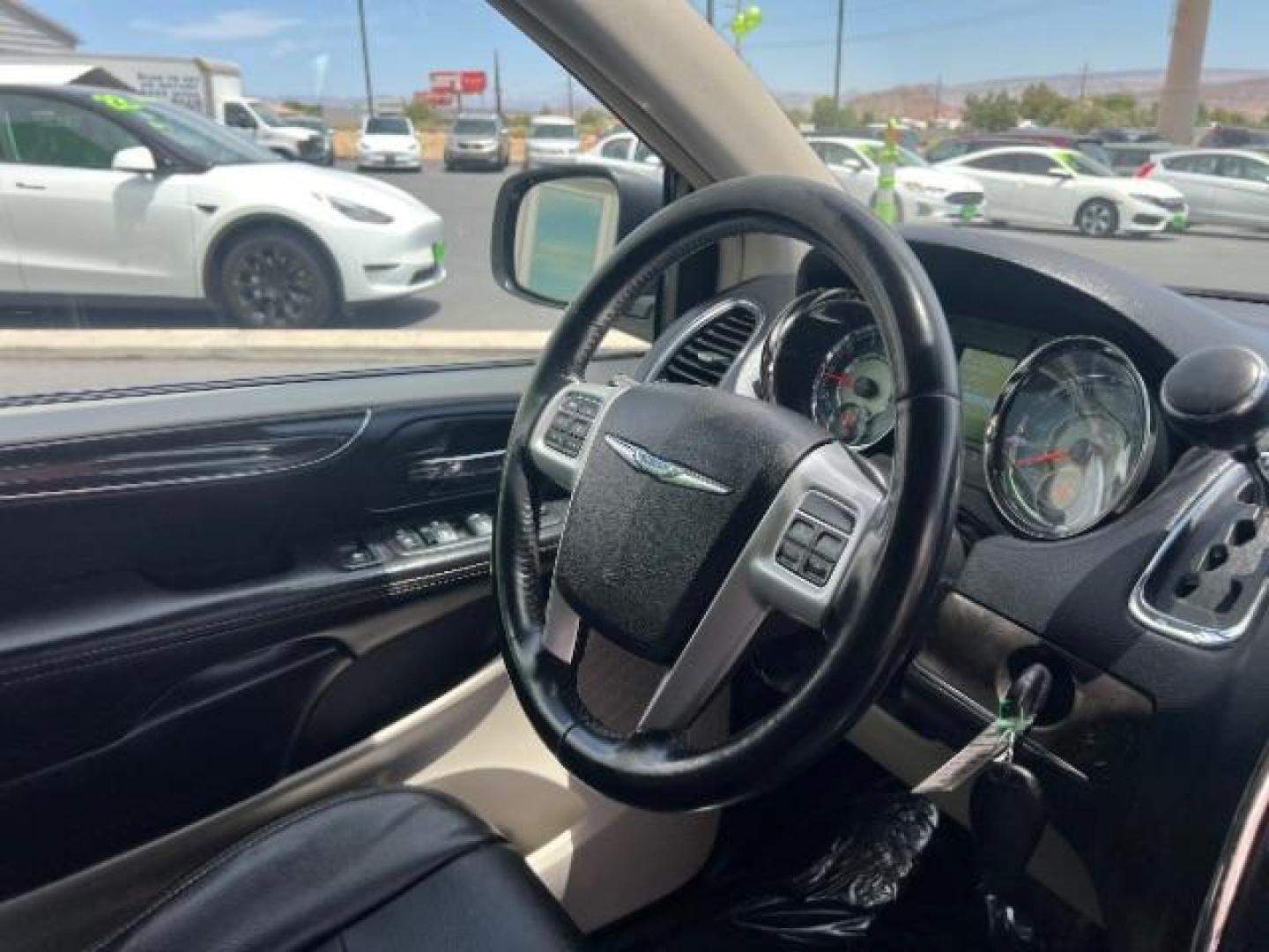 2014 Billet Silver Metallic Clearcoat /Black/Light Graystone Chrysler Town and Country Touring (2C4RC1BG1ER) with an Pentastar 3.6L V-6 DOHC engine, Automatic transmission, located at 940 North Main Street, Cedar City, UT, 84720, (435) 628-0023, 37.692936, -113.061897 - We specialize in helping ALL people get the best financing available. No matter your credit score, good, bad or none we can get you an amazing rate. Had a bankruptcy, divorce, or repossessions? We give you the green light to get your credit back on the road. Low down and affordable payments that fit- Photo#30