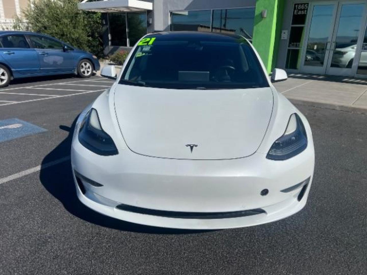 2021 Pearl White Multi-Coat /Black Tesla Model 3 Long Range (5YJ3E1EB6MF) with an ELECTRIC engine, Electric transmission, located at 1865 East Red Hills Pkwy, St. George, 84770, (435) 628-0023, 37.120850, -113.543640 - Excellent Tesla Model 3 Long Range All Wheel Drive. 5 Seats HW3, Interior and exterior in great condition. Small scratches and dings as pictured. Every Tesla we sell has had cabin air filter replaced, radiator cleaned, fluids topped AND comes with a mobile charging kit! Battery is healthy and gets- Photo#3