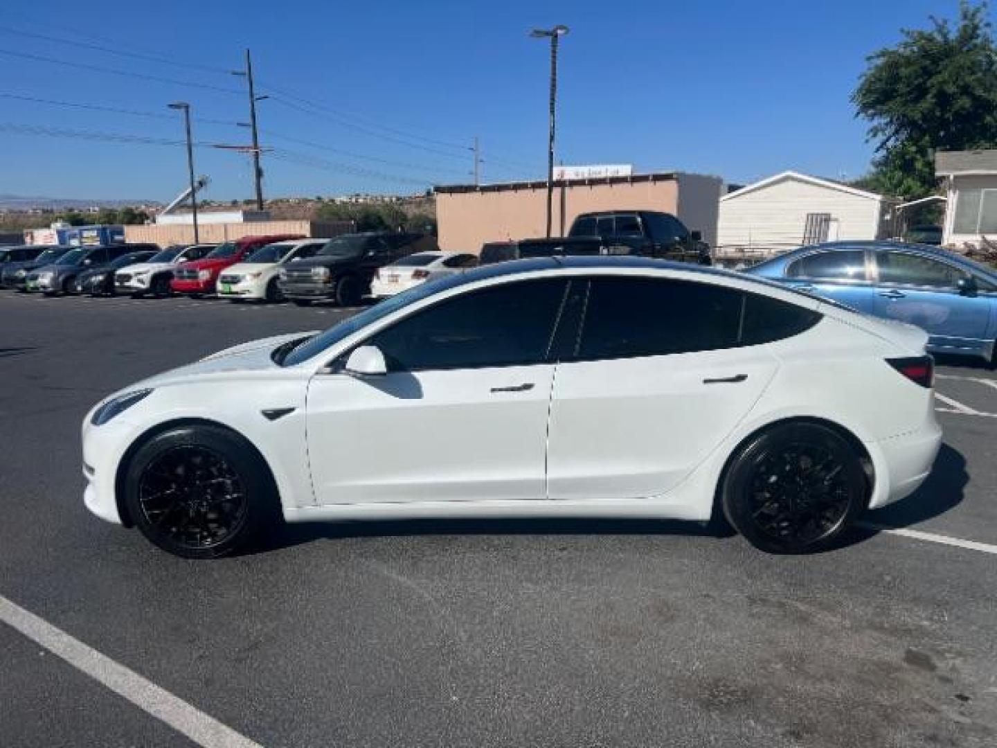 2021 Pearl White Multi-Coat /Black Tesla Model 3 Long Range (5YJ3E1EB6MF) with an ELECTRIC engine, Electric transmission, located at 1865 East Red Hills Pkwy, St. George, 84770, (435) 628-0023, 37.120850, -113.543640 - Excellent Tesla Model 3 Long Range All Wheel Drive. 5 Seats HW3, Interior and exterior in great condition. Small scratches and dings as pictured. Every Tesla we sell has had cabin air filter replaced, radiator cleaned, fluids topped AND comes with a mobile charging kit! Battery is healthy and gets- Photo#5