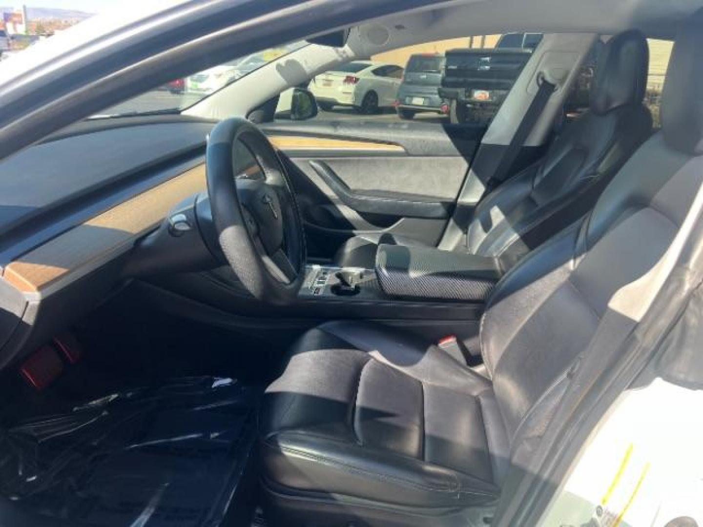 2021 Pearl White Multi-Coat /Black Tesla Model 3 Long Range (5YJ3E1EB6MF) with an ELECTRIC engine, Electric transmission, located at 1865 East Red Hills Pkwy, St. George, 84770, (435) 628-0023, 37.120850, -113.543640 - Excellent Tesla Model 3 Long Range All Wheel Drive. 5 Seats HW3, Interior and exterior in great condition. Small scratches and dings as pictured. Every Tesla we sell has had cabin air filter replaced, radiator cleaned, fluids topped AND comes with a mobile charging kit! Battery is healthy and gets- Photo#16