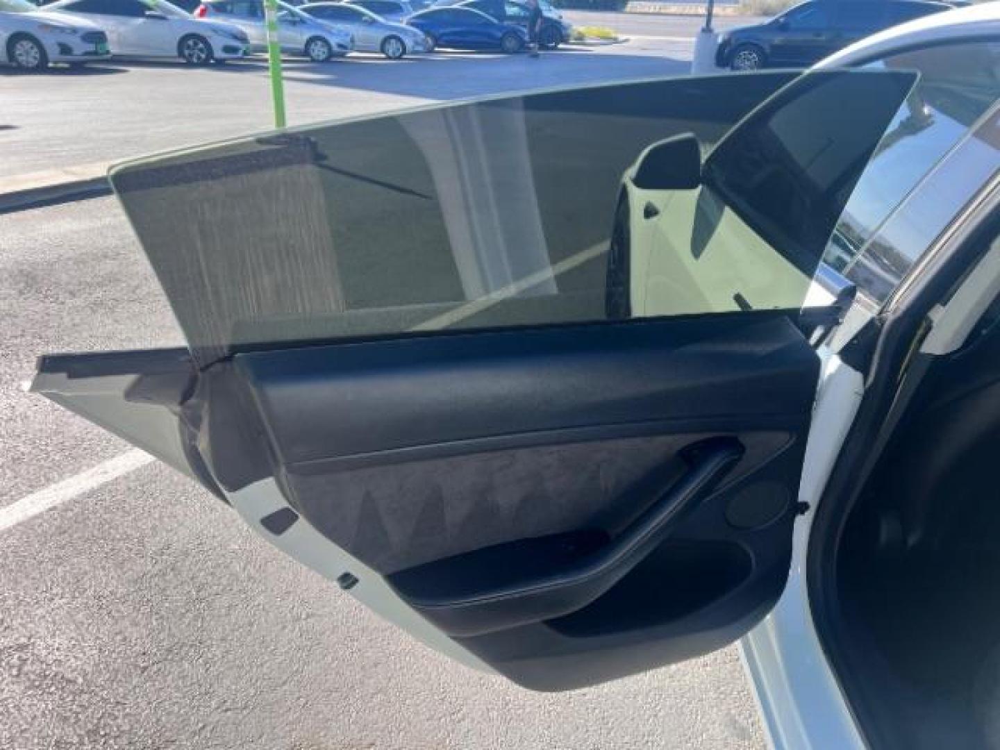 2021 Pearl White Multi-Coat /Black Tesla Model 3 Long Range (5YJ3E1EB6MF) with an ELECTRIC engine, Electric transmission, located at 1865 East Red Hills Pkwy, St. George, 84770, (435) 628-0023, 37.120850, -113.543640 - Excellent Tesla Model 3 Long Range All Wheel Drive. 5 Seats HW3, Interior and exterior in great condition. Small scratches and dings as pictured. Every Tesla we sell has had cabin air filter replaced, radiator cleaned, fluids topped AND comes with a mobile charging kit! Battery is healthy and gets- Photo#20