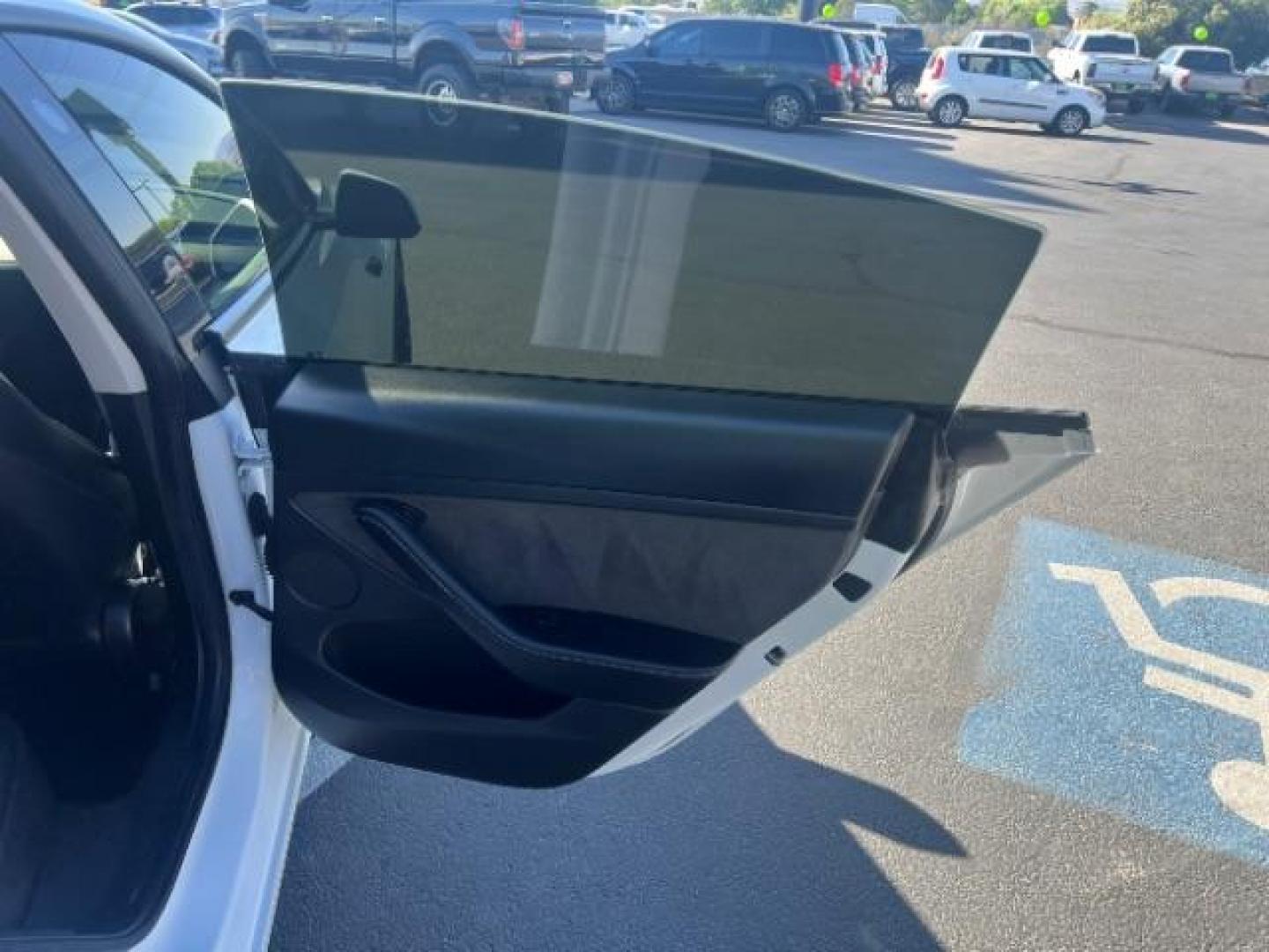 2021 Pearl White Multi-Coat /Black Tesla Model 3 Long Range (5YJ3E1EB6MF) with an ELECTRIC engine, Electric transmission, located at 1865 East Red Hills Pkwy, St. George, 84770, (435) 628-0023, 37.120850, -113.543640 - Excellent Tesla Model 3 Long Range All Wheel Drive. 5 Seats HW3, Interior and exterior in great condition. Small scratches and dings as pictured. Every Tesla we sell has had cabin air filter replaced, radiator cleaned, fluids topped AND comes with a mobile charging kit! Battery is healthy and gets- Photo#25