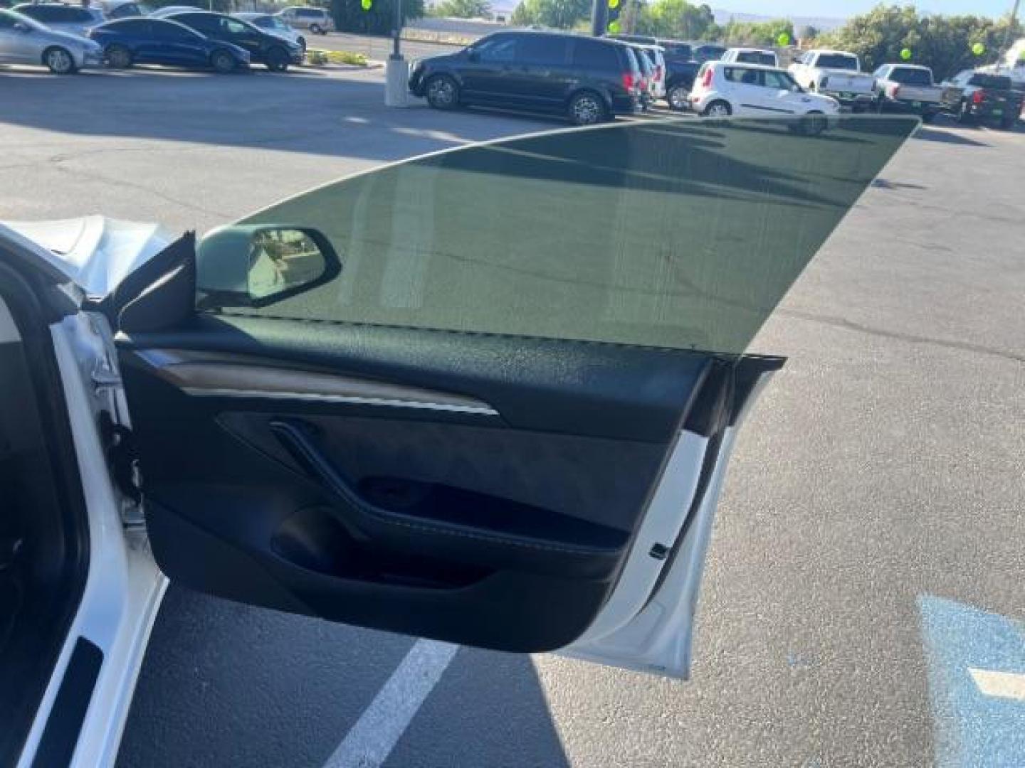 2021 Pearl White Multi-Coat /Black Tesla Model 3 Long Range (5YJ3E1EB6MF) with an ELECTRIC engine, Electric transmission, located at 1865 East Red Hills Pkwy, St. George, 84770, (435) 628-0023, 37.120850, -113.543640 - Excellent Tesla Model 3 Long Range All Wheel Drive. 5 Seats HW3, Interior and exterior in great condition. Small scratches and dings as pictured. Every Tesla we sell has had cabin air filter replaced, radiator cleaned, fluids topped AND comes with a mobile charging kit! Battery is healthy and gets- Photo#27