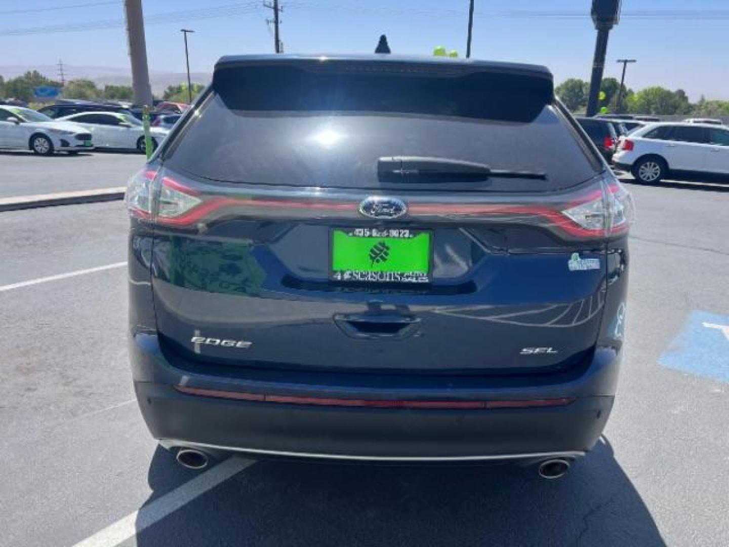 2017 Blue Jeans Metallic /Ebony Ford Edge SEL (2FMPK3J89HB) , Automatic transmission, located at 940 North Main Street, Cedar City, UT, 84720, (435) 628-0023, 37.692936, -113.061897 - We specialize in helping ALL people get the best financing available. No matter your credit score, good, bad or none we can get you an amazing rate. Had a bankruptcy, divorce, or repossessions? We give you the green light to get your credit back on the road. Low down and affordable payments that fit - Photo#5