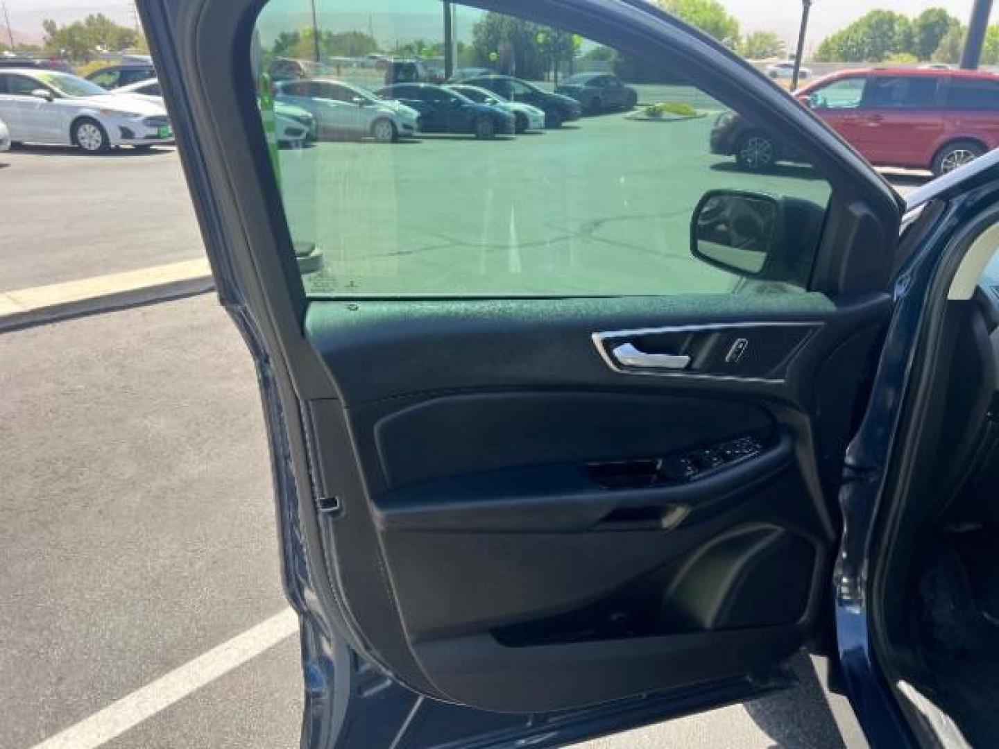 2017 Blue Jeans Metallic /Ebony Ford Edge SEL (2FMPK3J89HB) , Automatic transmission, located at 940 North Main Street, Cedar City, UT, 84720, (435) 628-0023, 37.692936, -113.061897 - We specialize in helping ALL people get the best financing available. No matter your credit score, good, bad or none we can get you an amazing rate. Had a bankruptcy, divorce, or repossessions? We give you the green light to get your credit back on the road. Low down and affordable payments that fit - Photo#12