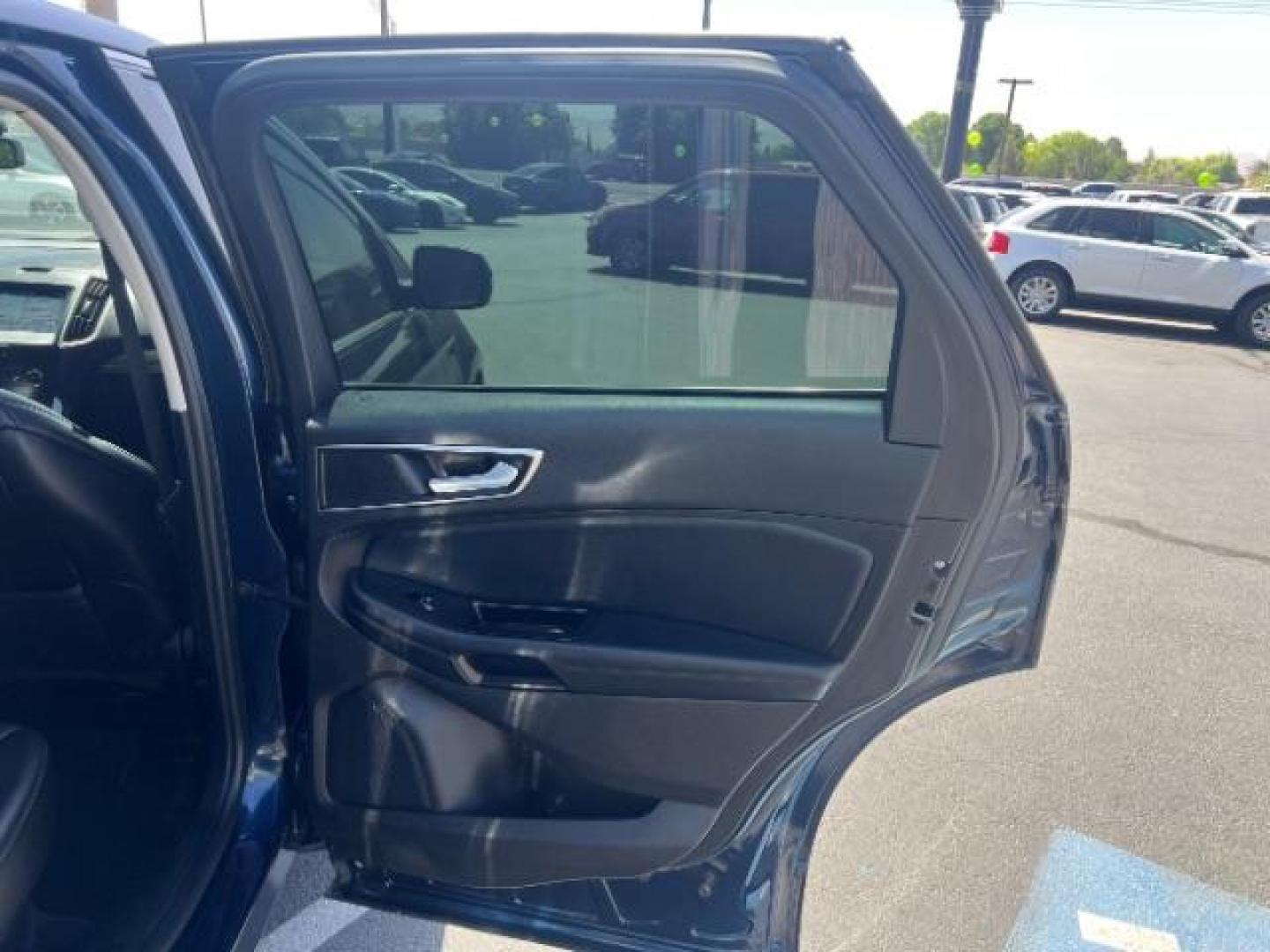2017 Blue Jeans Metallic /Ebony Ford Edge SEL (2FMPK3J89HB) , Automatic transmission, located at 940 North Main Street, Cedar City, UT, 84720, (435) 628-0023, 37.692936, -113.061897 - We specialize in helping ALL people get the best financing available. No matter your credit score, good, bad or none we can get you an amazing rate. Had a bankruptcy, divorce, or repossessions? We give you the green light to get your credit back on the road. Low down and affordable payments that fit - Photo#25