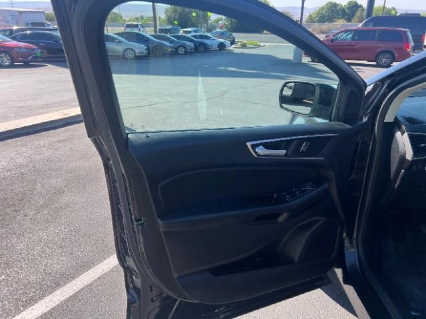 2015 Tuxedo Black Metallic /Ebony Ford Edge SEL (2FMTK4J8XFB) , Automatic transmission, located at 1865 East Red Hills Pkwy, St. George, 84770, (435) 628-0023, 37.120850, -113.543640 - We specialize in helping ALL people get the best financing available. No matter your credit score, good, bad or none we can get you an amazing rate. Had a bankruptcy, divorce, or repossessions? We give you the green light to get your credit back on the road. Low down and affordable payments that fit- Photo#12