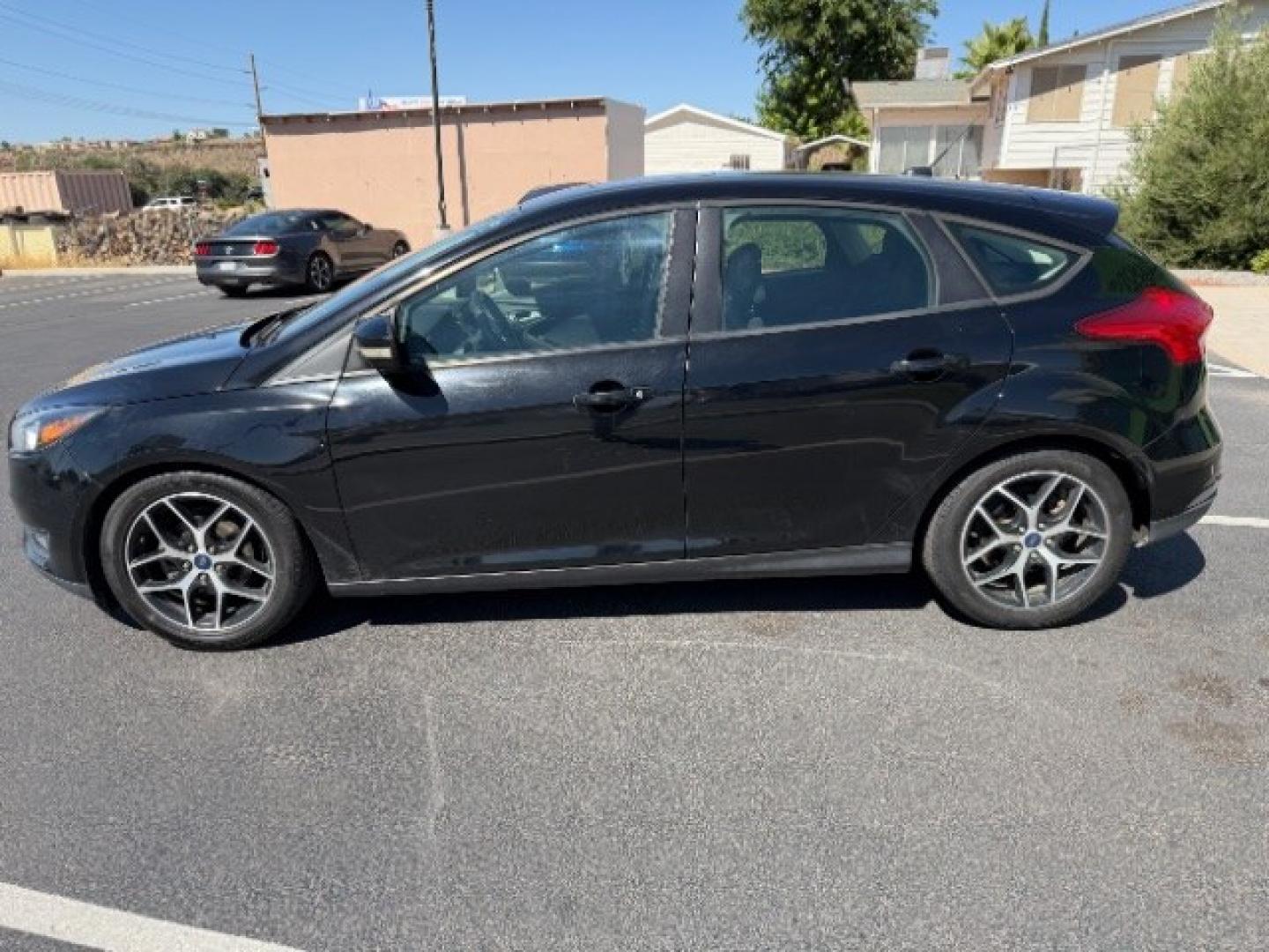 2017 Shadow Black /Charcoal Black Ford Focus SEL (1FADP3M26HL) with an 2L I-4 gasoline direct injection engine, Automatic transmission, located at 1865 East Red Hills Pkwy, St. George, 84770, (435) 628-0023, 37.120850, -113.543640 - We specialize in helping ALL people get the best financing available. No matter your credit score, good, bad or none we can get you an amazing rate. Had a bankruptcy, divorce, or repossessions? We give you the green light to get your credit back on the road. Low down and affordable payments that fit- Photo#5
