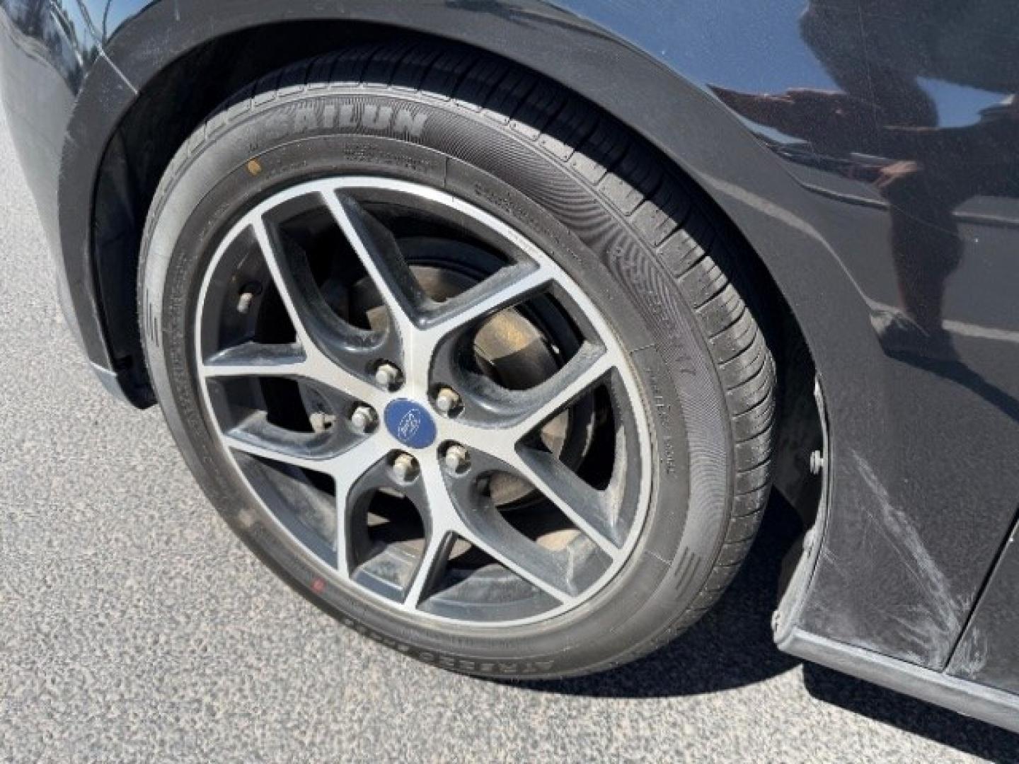 2017 Shadow Black /Charcoal Black Ford Focus SEL (1FADP3M26HL) with an 2L I-4 gasoline direct injection engine, Automatic transmission, located at 1865 East Red Hills Pkwy, St. George, 84770, (435) 628-0023, 37.120850, -113.543640 - We specialize in helping ALL people get the best financing available. No matter your credit score, good, bad or none we can get you an amazing rate. Had a bankruptcy, divorce, or repossessions? We give you the green light to get your credit back on the road. Low down and affordable payments that fit- Photo#12